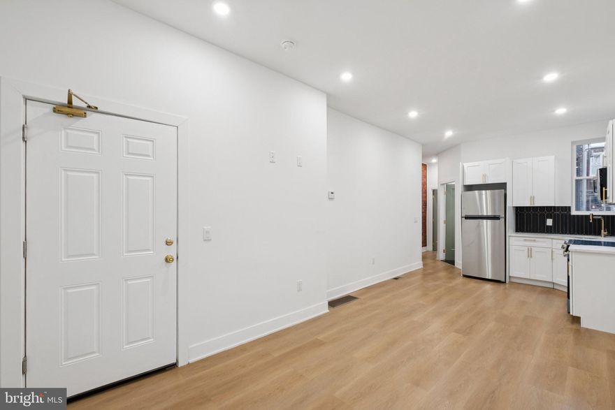 Welcome to this fully renovated duplex offering two beautifully finished units in a rapidly growing rental area of Philadelphia. This property has been completely rebuilt from the ground up—including all-new plumbing, electrical, HVAC, and a brand-new roof—providing long-term peace of mind for owners and tenants.

The first-floor unit features 1 bedroom, 1 bathroom, an in-unit washer and dryer, and direct access to a private backyard—perfect for tenants seeking outdoor space. The second-floor unit offers 2 spacious bedrooms and 1 bathroom, also equipped with its own stackable in-unit laundry. Both units include central air and heat, modern kitchens with refrigerators and microwaves, and durable LVP flooring throughout. Soundproof insulation has been installed between floors for added comfort and noise reduction.

Located in a strong rental market, projected rents are approximately $1,390 for the 1-bedroom and $1,660 for the 2-bedroom. This property is also situated in an Opportunity Area and qualifies for the PHA Housing Opportunity Program (HOP), allowing owners to market the units directly to PHA and lease to tenants from their waitlist—streamlining the leasing process and maximizing occupancy potential.

Whether you’re an investor looking for a turnkey asset or a house-hacker seeking income-producing stability, this fully gut-renovated duplex delivers quality, convenience, and excellent rental upside.