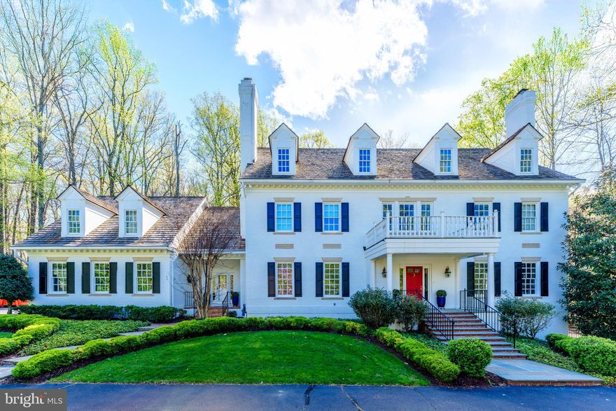 Welcome to a true legacy estate in the heart of McLean where sophistication meets sanctuary—elevated by over a decade of meticulous enhancements that blend classic design with modern comfort.
Privately nestled in one of McLean’s most coveted neighborhoods, this stately Georgian Colonial makes an unforgettable first impression with its newly painted white brick exterior, freshly sealed drive, and bold red front door. But the moment you step inside, you’ll understand this home wasn’t just maintained—it was curated.

This home presents an exquisite 6 BR, 7 Full BA, 2 Half BA residence, spanning an impressive 9,550 total square feet across 4 well-appointed levels.  The main level welcomes you through a stately covered front porch into a grand two-story foyer, flanked by a formal living room and dining room, each featuring a gas fireplace and large windows that bring in abundant natural light. Over the past ten years, the owners have spared no expense transforming every corner of this estate. The kitchen renovation is show-stopping: gleaming marble and quartz surfaces, Thermador gas cooktop, custom hood, mirror tile backsplash, and chic hardware make this a space that’s both luxurious and livable. 

The main level also includes a stately executive office with mahogany panel walls and shelving, and large windows allowing views and sunlight. Also on the main level is a sun-filled den and a cozy in-law/guest bedroom with an ensuite bath, two half-bathrooms, and easy access to the mudroom and 3-car garage.

The primary suite bathroom is a tranquil haven, fully renovated in 2022 to include a new soaking tub, designer fixtures, custom tilework, dramatic lighting, and elegant wallpaper. Three additional en-suite bedrooms and a laundry room complete this level’s offerings, ensuring plenty of space and privacy for family and guests alike. 

The third level is designed with both function and leisure in mind, featuring an enormous family room (game room or craft room), a large fifth bedroom, and a full bathroom.
The lower level offers expansive living areas, including a multifunctional recreation room lined with wood paneling, a wet bar, an island, and a gas fireplace, perfect for casual lounging or entertaining, a media room, full bathroom, and ample storage add to the level’s versatility. 

Each space has been refreshed with thoughtful updates—from new recessed lighting, paint, modern switches, and outlets in bedrooms and living areas, to major mechanical investments like four new HVAC systems and furnaces. The interior has been repainted for a crisp, modern look, and a new second-floor laundry room brings practical luxury to everyday life. A new mudroom, additional closet space, upgraded flooring, and even a newly renovated lower-level recreation room with its own HVAC.  It's all here.

But this property’s crown jewel is its resort-quality outdoor living experience. Picture this: a renovated bluestone pool deck framing a blue plastered pool with new tile, coping, auto cover, lighting, and lounge seating worthy of a five-star hotel. Nearby, a stacked stone pavilion with a wood-burning fireplace, wet bar, and lounge seating invites year-round entertaining. A deer fence ensures privacy and peace throughout the beautifully manicured grounds, and for added security, in 2025 a new security system has been installed and the whole-house generator has been refurbished and ready for any season.

Don’t miss the Pickle Ball and Tennis courts just across the street!

Located minutes from downtown McLean, Tysons, the Toll Road and Rt 495, and just a quick commute to D.C., this home offers the rare combination of absolute seclusion and ultimate access. Top-tier schools, shopping, dining, and international airports are all within reach—yet inside the gates, you feel a world apart.
This isn’t just a luxury home. It’s the product of vision, investment, and impeccable care.