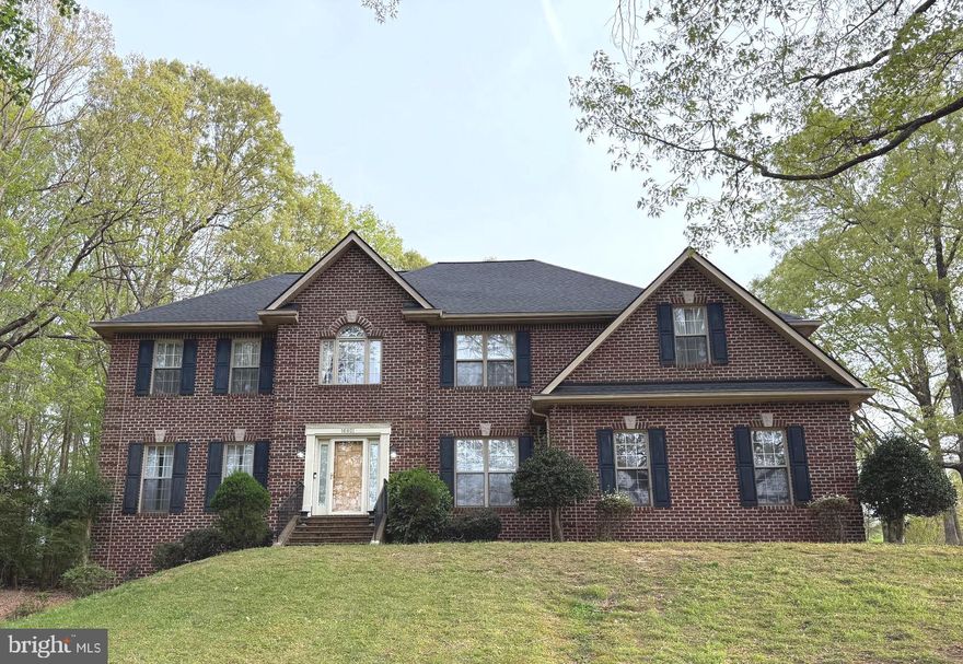 An Elegant Sanctuary in Swanson Creek Landing – Where Sophistication Meets Comfort

Welcome to your future residence in the prestigious enclave of Swanson Creek Landing, where timeless elegance meets modern convenience. This stately and expansive four-bedroom, three-and-a-half-bathroom estate—with the potential for a fifth bedroom—offers an extraordinary living experience defined by space, serenity, and distinction.

Step through a soaring two-story foyer, a grand entrance that sets the tone for the refined interiors within. Just off the foyer, a private study or library provides an ideal sanctuary for those who work remotely or seek a tranquil reading retreat.

The heart of the home is the graciously appointed living room, featuring dramatic vaulted ceilings and a wood-burning fireplace, offering warmth and charm for intimate gatherings or relaxing evenings.

Upstairs, four generously sized bedrooms provide ample comfort. The primary suite is a true retreat, complete with a spacious walk-in closet and a luxurious en-suite bath, boasting a deep soaking tub, separate standing shower, and premium finishes. One of the secondary bedrooms includes an adjoining bonus room, ideal as a private sitting area, additional office space, or playroom.

The fully finished lower level features its own private entrance, a full bathroom, and remarkable versatility—perfect as a guest suite, entertainment lounge, fifth bedroom, or den.

Outdoors, a sweeping rear deck invites you to unwind or entertain against a backdrop of peaceful natural surroundings—perfect for morning coffee, evening gatherings, or serene solitude.

Enjoy the convenience of included lawn care, allowing you to relish the lush, manicured grounds without lifting a finger. Commuters will appreciate the home's strategic location, offering easy access to Washington D.C., Andrews Air Force Base, and Patuxent River (Pax River). All applicants must meet the following requirements: Owner requires at least a 600 credit score. No previous evictions. Income must be three times amount of rent. No co-signers will be considered. This is a smoke free home.