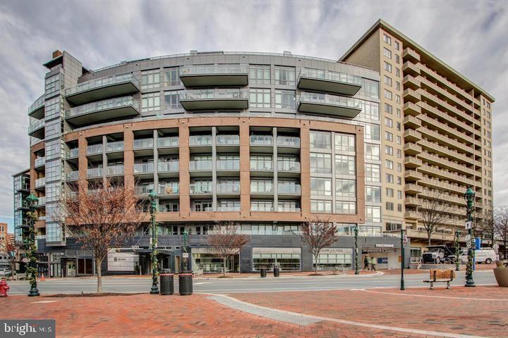 Downtown Bethesda condo in the luxury Darcy Condominium. This condo boasts a sun drenched living space with floor-to-ceiling windows, in unit washer/dryer, a spacious bedroom, and den perfectly suitable as an extra bedroom or home office. Steps from the Bethesda metro, restaurants, grocery, retail, and more. Access to fitness room and two parking spaces included.