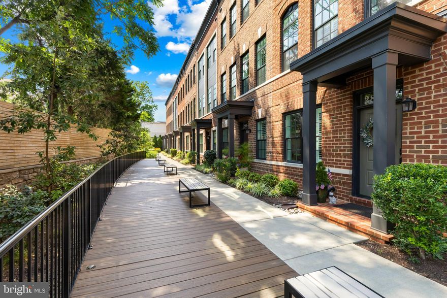 Enjoy urban living at 285 West Street #15! This stunning property offers a stylish way to embrace the best of downtown Annapolis in a modern townhome with an elevator and rooftop deck. Step outside and enjoy the city’s energy—shops, restaurants, the waterfront, and cultural attractions are all just a short stroll away—while still savoring the comfort of a private, lock-and-leave retreat.

Built by Bozzuto in 2020, this four-bedroom, four-and-a-half-bath home features an open, light-filled layout designed for both everyday living and entertaining. The open floor plan on the main level includes the living room with spacious seating area and fireplace, a dining area, and a classic all white gourmet kitchen anchored by an island with ample seating, high-end appliances, and a built-in sideboard with beverage center. Upstairs, the primary suite offers two walk-in closets and a spa-like bath with double vanities, and a large tiled shower. An additional bedrooms with ensuite bath and conveniently located laundry room complete the this level.  Head upstairs to the top floor via the stairs or elevator to enjoy the inviting family room, guest bedroom and enviable rooftop deck with double sided fireplace and sunshade, an incredible retreat for relaxing and entertaining on a beautiful evening.

The entry level provides a flexible bedroom or office with full bath and boasts heated floors for added comfort.  Rounding out the appeal is a two-car garage, plenty of storage and a plethora of upgrades and curated finishes throughout.

Perfectly located within close proximity of everything Annapolis has to offer; walk to the shops and restaurants of West and Main Streets as well as the Historic District, City Dock and the Naval Academy. Traveling or commuting is just as convenient by easily accessing Rt. 50 and 97 which provides direct access to Baltimore, BWI, Ft. Meade/NSA and Washington, DC., or head over the Bay Bridge to the Eastern Shore for a quick beach vacation. Welcome Home!