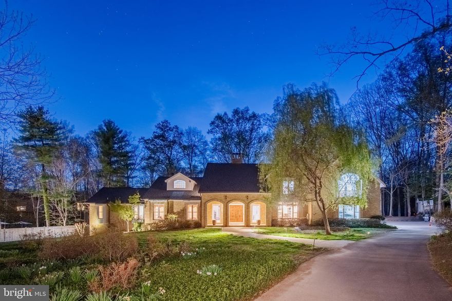 Nestled in the highly desirable Potomac Village subdivision, this exceptional all-brick estate offers the perfect blend of timeless elegance, thoughtful design, and modern luxury—all set on a beautifully flat and expansive 2.07-acre lot. Ideally located just minutes from Bethesda, Chevy Chase, and Washington, and within walking distance to Potomac Village, this home provides both convenience and a serene, private setting.

A long, private driveway welcomes you with ample parking and leads to a side-load two-car garage, offering seamless access directly into the kitchen—perfect for everyday ease. Built with solid brick construction and showcasing high-end finishes throughout, this residence features over 8,000 square feet of finished living space, highlighted by soaring ceilings, rich hardwood flooring, and abundant recessed lighting. At the heart of the home is a gourmet chef’s kitchen, designed for both everyday living and entertaining, with direct access from the garage and open flow into the main living areas. Designed with a versatile and transitional floor plan, the home offers 7 spacious bedrooms, 6 full bathrooms, and a powder room. The main level is anchored by a luxurious primary suite complete with dual en-suite bathrooms, creating a true retreat. Upstairs, you’ll find five generously sized bedrooms and three full bathrooms, including a second primary suite—ideal for multigenerational living or extended stays. The fully finished lower level adds even more living space, featuring an additional bedroom, full bathroom, and 900 square feet of unfinished space ready for customization.

With its rare combination of size, location, quality construction, and walkability to the vibrant shops and restaurants of Potomac Village, this extraordinary property presents a unique opportunity to own a truly distinguished home in one of the area’s most sought-after communities.