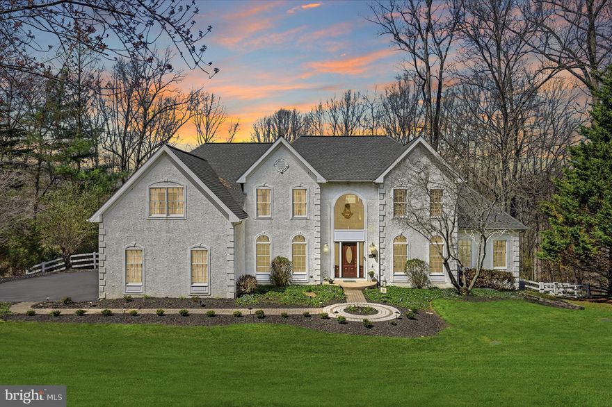 Set on one of the most coveted lots in the community, 59 Founders is among the largest models available—an exceptional residence defined by impeccable care, thoughtful design, and a backyard that truly stands out as one of the finest in the neighborhood. Meticulously maintained and upgraded throughout, every detail of this home reflects pride of ownership and intentional living. 

The front of the home and driveway are framed by vibrant cherry blossom trees that come into full bloom each spring, creating a striking and picturesque arrival.

The main level is both elegant and inviting. A grand two-story foyer welcomes you with marble flooring and a dramatic bifurcated staircase, setting a sophisticated tone. At its heart, the kitchen features granite and Corian surfaces, hardwood flooring, a spacious island with Jenn Air gas cooktop and seating for four, double ovens, and a charming eat-in area that extends outward to the expansive deck—perfect for entertaining or quiet mornings overlooking the beautifully open backyard. A trio of windows above the sink frames serene views of the rear grounds.

The adjacent family room impresses with vaulted ceilings, skylights, a striking stone fireplace (gas with remote), and a ceiling fan—creating a warm yet airy gathering space. Formal living and dining rooms offer classic detailing including chair rail accents, while a private office with built-ins provides an ideal work-from-home setting. A sun-drenched conservatory—featuring the maximum number of windows—offers endless flexibility as a game room, studio, or additional lounge. A well-placed powder room and a laundry room with added cabinetry enhance everyday convenience.

Upstairs, the owner’s suite is a true retreat, complete with a tray ceiling, sitting room, expansive walk-in closet, and a spa-inspired bath with a soaking tub, separate shower, dual vanities, skylight, and vaulted ceilings. Three additional bedrooms are well-appointed, including a Jack-and-Jill bath with dual sinks and a third full bath, ensuring comfort and convenience for all. The owner’s suite and all three additional bedrooms feature ceiling fans.

The finished, walk-out lower level expands the home’s versatility, highlighted by a thoughtful relocation of the HVAC system that enhances openness and functionality—a rare and impactful upgrade. With 9-foot ceilings, abundant storage, a flexible bump-out ideal for a bar, playroom, or lounge, and a full bath, this level adapts to a variety of needs. Daylight windows and sliding doors lead to a stunning paver patio, seamlessly blending indoor and outdoor living, while electric baseboard heat ensures year-round comfort.

Outdoors, the property is fully enclosed with a white vinyl fence that complements the home’s aesthetic, creating a polished and private setting for relaxation or entertaining.

This home is as sound as it is stunning, with a stucco inspection passed with flying colors, a roof with transferable warranty, all four skylights replaced in 2018, and brand-new two-zone HVAC systems (2026) with warranty. Additional highlights include a whole-house generator, security system, holiday lighting package, and a chandelier lift for effortless maintenance.

The outdoor setting is simply unmatched—private, expansive, and thoughtfully opened with selective tree removal, offering unobstructed enjoyment of the natural surroundings, with nothing behind but the tranquil “fingers” of the reservoir. 

Ideally located just moments from Marsh Creek State Park, near Shamona Creek Elementary School and the 6th Grade Center, and close to Pennypacker Country Club, this home offers a rare blend of luxury, privacy, and convenience.

A home where every detail has been considered—and it shows.