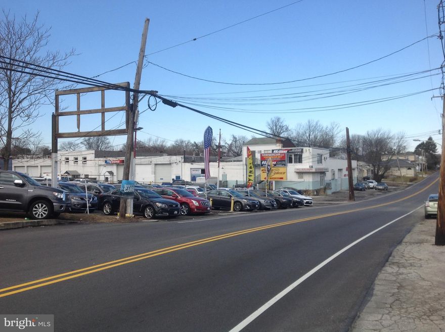 2.375 +/- Acre expansive property consisting of three parcels (Tax ID 15-00-02315-00, 15-00-02316-00, 15-00-02317-00) with large existing 24,804 square foot masonry building with a massive parking lot featuring 20 high vertical garage bays, 6 above ground lifts, many offices, paint booth, prep room with a massive parking area.  The property houses varying businesses and currently has six short term leases that may be terminated within 30 - 60 days.  However, given its  strategic location the property may be best suited for New Retail Development with 296 +/- foot of frontage on busy Oak Lane/Ave that nears the corner of MacDade Boulevard and Oak with heavy car volume with an average of over 15,000 cars passing each day.  The property is also strategically positioned as it backs up against a huge shopping center with Shop Rite anchoring retail shops and businesses.   This property won't last long! The subject building is a one and two story detached building with approximately 24,804 square feet of gross building area. There is an addition detached storage garage in the rear of the property.  There is a Signboard Easement that will remain with the Sellers. The property is being sold "As Is."