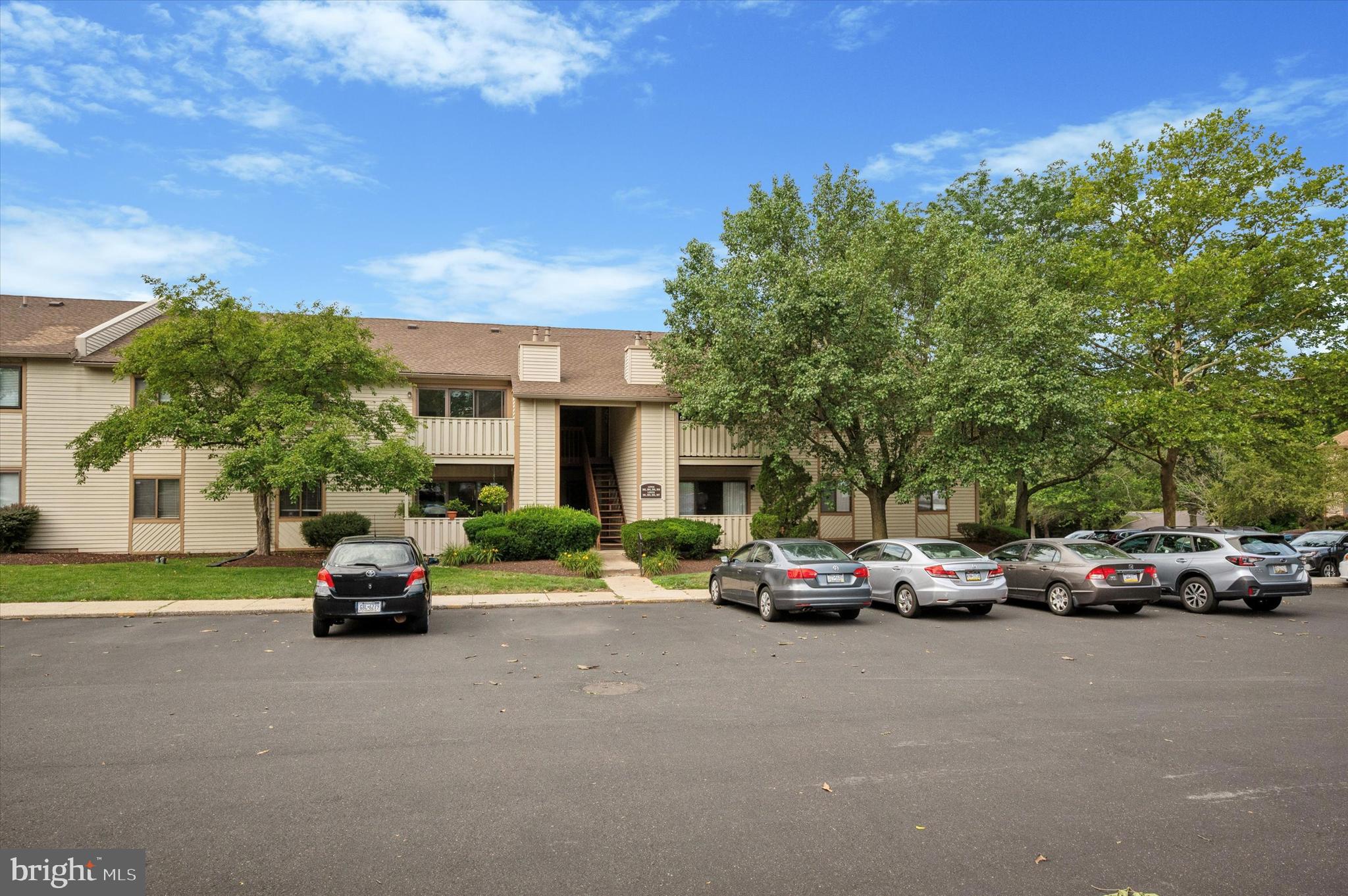 Welcome to 206 Hickory Court – a bright and spacious 2-bedroom, 2-bath condo in the highly sought-after Timber Creek community. This second-floor unit offers an open-concept layout with generous living and dining space, a well-equipped kitchen, and private balcony. The primary bedroom features an en-suite bath and ample closet space. Enjoy the convenience of in-unit laundry, central air, and assigned parking. Located close to major highways, shops, and restaurants.
