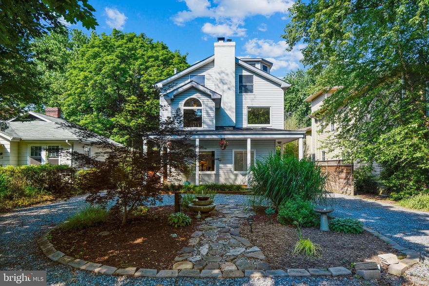 The quintessential, over-sized Bay Ridge cottage with an open floor plan, classic nooks and crannies, and picture windows that provide charm and interest throughout. Two side entrances give guests a choice of entry - one entrance onto the outside entertainment deck and the other via the side porch access with large windows and skylights. Both entries take you into the first-floor great room with a spacious gourmet kitchen/dining and living area. Proceeding past the kitchen, you enter a separate en-suite bedroom and parlor/office area. The side staircase takes you to the large second floor that houses an open family room with wood burning stove and office nook, a master bedroom suite with walk-in closet and private access to the second floor open deck and a surprising architectural feature - a sleeping bed perfectly centered in the screened porch deck. Continuing upwards, the third floor boasts two dormered bedrooms with walk in closets, a full bath and middle room gathering space. And, most surprisingly, a ladder staircase to the renovated attic studio with 360-degree views of the Bay Ridge area. Oak flooring throughout the top three levels enhances the warmth and sunny nature of the home. A circular staircase curves down to the lower level which houses the second of two laundry areas and a large family room with a decorative fireplace off yet another en-suite bedroom. The large, flat back yard is perfect for cookouts, t-ball or Frisbee games and provides pets a special outside retreat. A separate shed with garage design houses landscaping and sports equipment and a bonus room on the second floor to be used as you choose.