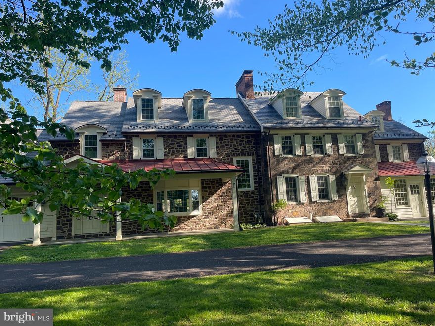 Professional photos coming soon!
Tucked away on 4+ acres, this exceptional Circa 1799  Bucks County stone farmhouse—with a seamless 6,000+ sq ft addition—beautifully blends old world charm with modern luxury. Original details include exposed stone walls, wood beams, wide plank floors, deep windowsills, and multiple fireplaces, while the thoughtfully designed addition showcases high-end finishes and craftsmanship throughout. The gourmet kitchen features a vaulted beamed ceiling, three walls of windows, French doors, a center island with farm sink, Viking gas range, Sub-Zero refrigerator, custom cabinetry, honed granite, and radiant-heated bluestone floors. French doors open to an expansive bluestone patio with an outdoor fireplace, pizza oven, gas grill, and heated saltwater Gunite pool—perfect for entertaining. The main level offers a grand dining room with a stone fireplace, a den with original fireplace and porch access, a sunroom, and a mud/laundry hall with built-ins, soapstone sink, and window seat, plus a full bath with a copper tub. The 2015 3,000+ sf addition includes a stunning great room with an  exposed stone wall, gas fireplace, vaulted ceiling, built-ins, and patio access, along with a princess suite, powder room, and custom storage. Upstairs, the luxurious primary suite boasts a sitting room/office with a balcony, spa-like bath, and large walk-in closet. A loft/bonus room, laundry room, two bedrooms, and full bath complete the second level, while the third level offers two additional bedrooms and a hall bath.  Public water and sewer. A rare offering in a prime suburban location near shopping, major roadways, and public transportation—convenient to Philadelphia, Princeton, and NYC.  Pennsbury Schools.