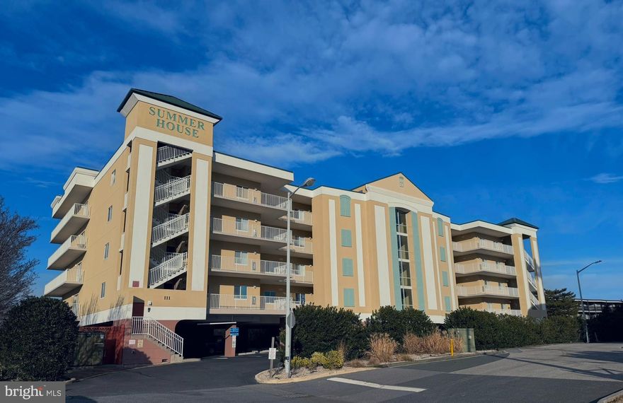Welcome to Summer House Unit 107, a rare opportunity to own one of the most desirable residences in Ocean City. This end unit condo offers one of the largest floor plans in the building, enhanced by additional windows that flood the space with natural light. Thoughtfully designed for comfort and privacy, all three bedrooms feature their own ensuite bathrooms, making it ideal for hosting family and guests.

Enjoy coastal living at its best with an oversized covered balcony overlooking the pool located directly outside, perfect for relaxing or entertaining. Inside, recent upgrades elevate the unit, including recessed lighting, updated bathroom hardware, new HVAC, and a brand-new washer and dryer. The kitchen features stainless steel appliances, and the living area is anchored by a cozy gas fireplace. The unit is being offered fully furnished, allowing for a seamless move-in or rental opportunity.

Storage is truly exceptional, with enormous closet space throughout, a huge walk-in closet in the primary bedroom, and an extra-large private storage closet just outside the unit, ideal for all your beach gear. Located within just a two block walk to the beach, this pristine unit combines space, upgrades, and an unbeatable location for the ultimate Ocean City lifestyle.