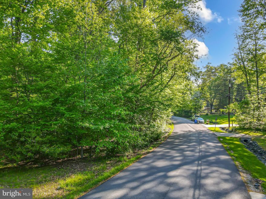 Located at 13314 Forest Drive in Bowie, Maryland, this 2.08-acre residential lot offers a rare opportunity to build a custom home in a quiet, picturesque setting. Surrounded by mature trees and nestled within a charming neighborhood of private homes, the property combines natural beauty with a warm, Southern feel.

The lot provides both privacy and convenience, just minutes from major commuter routes including Route 50 and Route 301. Its central location places you within easy reach of Bowie Town Center, Downtown Annapolis, Washington, D.C., and Anne Arundel County, making it ideal for those who want to enjoy peaceful surroundings without sacrificing accessibility.

Bowie itself offers a wide range of amenities for residents, including a local university, a minor league baseball stadium, parks, shopping centers, and year-round community activities. With no homeowners association, you’ll have the flexibility to design and build a home that fits your vision.

Whether you're looking for a quiet retreat close to nature or a central location with quick access to nearby cities, this lot offers the best of both worlds and a chance to create something truly special.
