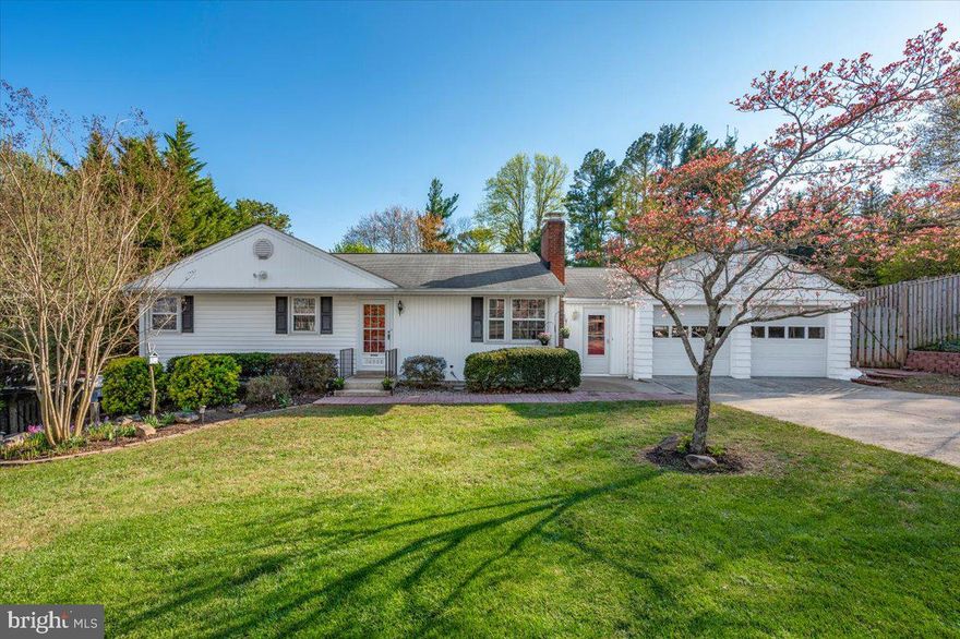 Curb appeal galore and perfectly situated on a half-acre lot.  Refinished gleaming hardwood floors, LVP flooring, new carpet and freshly painted interior...move in condition.  Living Room with wood-burning fireplace.  Updated Kitchen with custom cabinets, new refrigerator and dishwasher.  Primary Bedroom with Half Bath, two additional bedrooms and a Full Hall Bath.  Mudroom from "friend's door" leading to a three-season Sunroom overlooking gorgeous rear yard. The daylight lower level has a Recreation Room, Bedroom, Full Bath, Office/Den, Laundry Area and Storage Room.  Great extra space!  Two-car Garage and driveway with turn-around pad.  The half acre lot has a rear fenced yard and plenty of space for a garden, play set, fire pit, corn hole...the possibilities are endless.  Extra storage area under Sunroom.  Conveniently located on Sweepstakes Road with easy access to either Rt.124 or Rt. 27 and walking distance to the Magruder Trail.  Don't MissThis One!