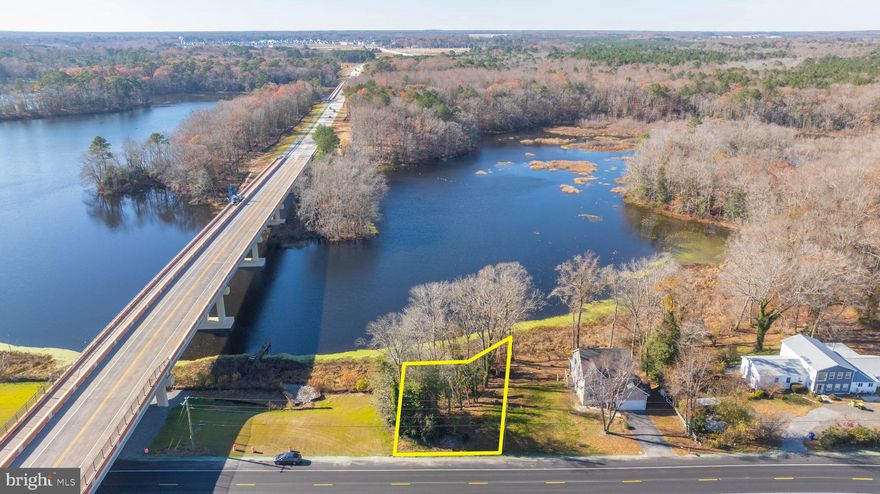 This is a rare opportunity to build your dream house on a navigable lake close to the ocean and Indian River Bay.   For the lucky owner's convenience,  there's a municipal boat launch ramp less than a minute away.  Or you can put in a kayak or canoe right from your own backyard. It's the perfect location location for fresh water fisherman and recreational boating. Near the junction of Rte. 24, the property is close to Bethany Beach and Rehoboth will all the fine dining and shopping opportunities one would hope for, plus all the recreational opportunities between Lewes DE and Ocean City MD.This is a rare opportunity to build your dream house on a navigable lake close to the ocean and Indian River Bay.   For the lucky owner's convenience,  there's a municipal boat launch ramp less than a minute away.  Or you can put in a kayak or canoe right from your own backyard. It's the perfect location location for fresh water fisherman and recreational boating. Near the junction of Rte. 24, the property is close to Bethany Beach and Rehoboth Beach with lots of opportunity for fine dining and shopping, plus all the recreational opportunities between Lewes DE and Ocean City MD. Erecting a dock needs approval of the Town of Millsboro and Delaware Department of Natural Resources and Environmental Control (DNREC).