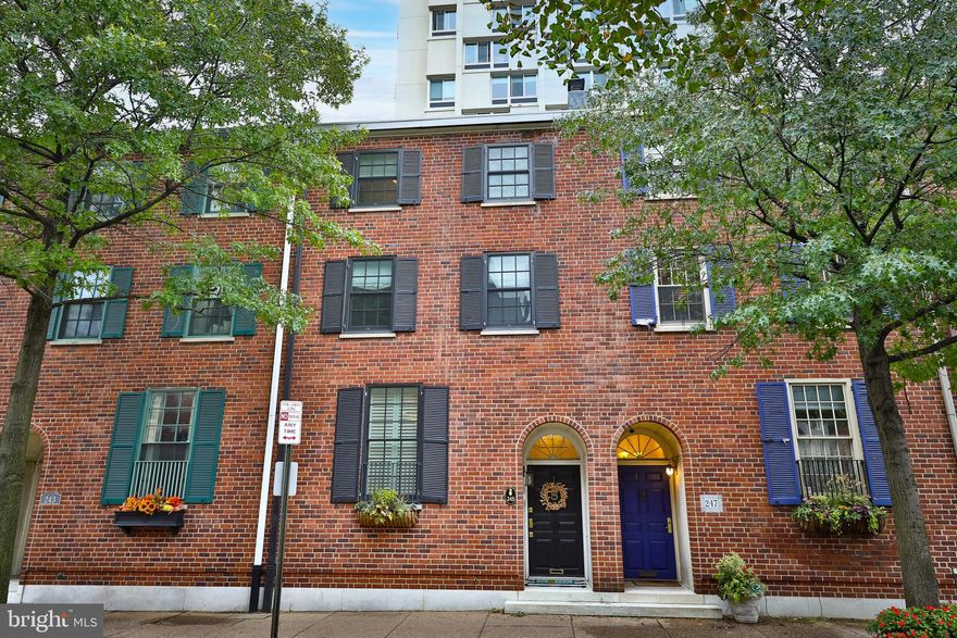 Modern finishes blend with traditional charm in this stunning 4 bedroom, 3 bath home with TWO CAR COVERED PARKING and views of Washington Square Park from every room. The bright and open kitchen, dining and living area with an amazing patio overlooking the Square are perfect for entertaining and everyday living! The large kitchen is both functional and beautiful, featuring marble countertops, generous counter space, a wine fridge, farmhouse sink, and a double tap for draft beer or coffee! This gorgeous living space features high ceilings, floor to ceiling built-ins with a convenient and attractive library ladder for easy access, and sliding glass doors to the oversized patio. Step out to an outdoor oasis featuring a pergola, outdoor TV access and views of the park. Whether you’re entertaining, watching your favorite Philly team win, or enjoying a quiet cup of coffee, this space will be your go to! The second floor includes a full bath and Great Room that could be a 4th bedroom or family room with 3 large customized closets. The primary bedroom offers an ensuite bath, Juliette balcony and large walk-in closet with ladder access to an additional storage area. The third floor features two more bedrooms, another full bathroom and an oversized linen closet with additional storage cabinets. Other house amenities include a tankless hot water heater, washer and dryer and kegerator located in the basement. Two car covered parking is located directly behind the home. Additional attributes of the home include, all new Pella windows and lighting fixtures, hardwood floors with radiant floor heating on the first floor, and crown moldings throughout. This gorgeous home is central to everything the city has to offer including Philadelphia’s historic sites, museums, Avenue of the Arts, Italian Market, the Delaware River waterfront, and renowned restaurants, such as Talula's Garden, Morimoto's, Kanella Grill, Pinefish and Jones - to name a few!
Photos are from a prior listing.