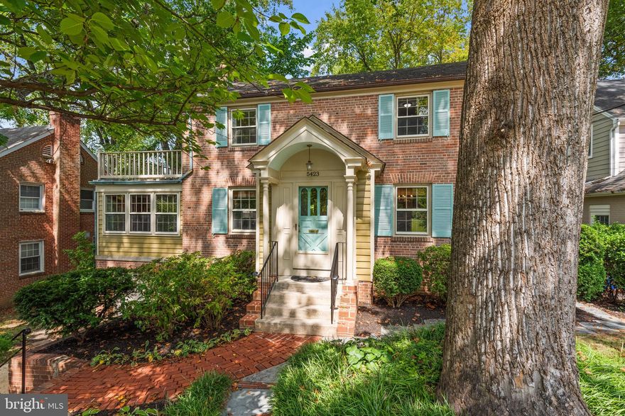 New Price!  Come take a look!  Vibrant and Inviting  Battery Park Hills Home!   This timeless 1948 brick Colonial has been beautifully expanded and updated over the years and offers fabulous indoor/outdoor living with its wrap-around deck and picturesque yard.  5423 Harwood Road  has four bedrooms, three and a half bathrooms on three levels, with a total of 4,024 interior square feet.  The main floor includes a foyer, formal dining room, kitchen with separate breakfast room, family room opening to the deck, living room with wood burning fireplace, den/sunroom and half bath.  Skylights and a second staircase to the upper level add light and charm.  The upper level provides three good-size bedrooms and two updated bathrooms (including a spacious primary suite with walk-in closet, bathroom with separate tub and shower, and walk-out deck), as well as a laundry room.  The partially-finished lower level offers plenty of space, including a fourth bedroom opportunity, third full bathroom, storage room, and utility room.  The enchanting wrap-around deck along the back of the home provides expansive outdoor space for dining, entertaining, and enjoying the peaceful canopy of trees.  Harwood Road is a quiet cul de sac in the middle of downtown Bethesda and the exquisitely landscaped lot is 8,081 square foot (0.19 acre). 

The property is located within the popular Battery Park Hills Neighborhood and the Walt Whitman High School District.  Walk to Metro and all the shops and restaurants in downtown Bethesda! Open Sunday 2-4!