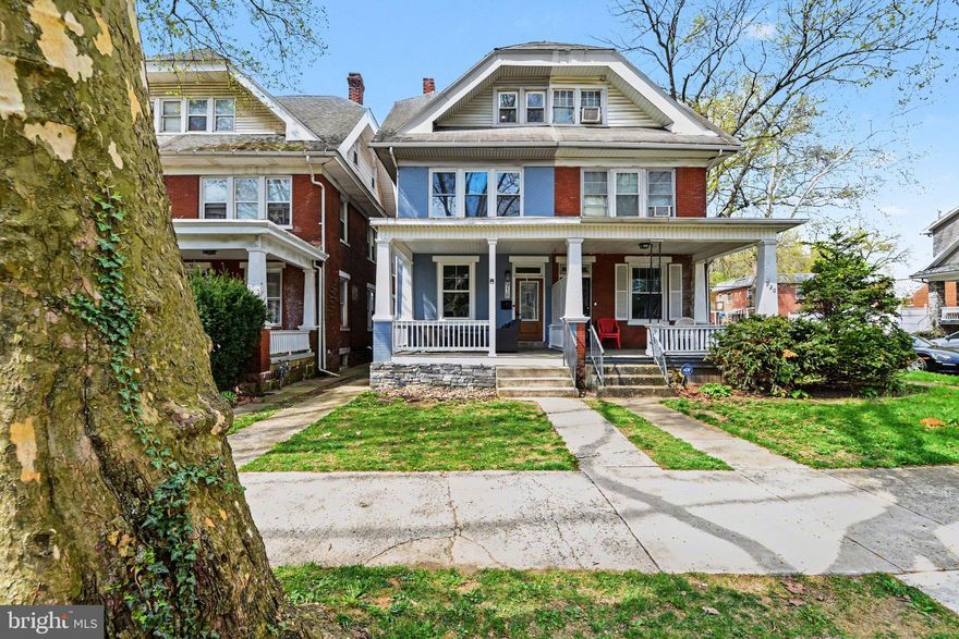 Enjoy carefree living in this 5 bedroom 3.5 bath semi-detached home with 1 car garage centrally located in Harrisburg.  This home is specifically designed for those who crave a current spacious open 1st floor living area. You'll feel welcome once you walk up the sidewalk onto the front porch and open the door for the first time. You will notice an open floor plan with hardwood floors. From the living room, leads to the half bath, dining room and kitchen with all stainless steel appliances to convey. You'll find that the kitchen has plenty of cabinets, expansive island and counter space to do your day to day cooking. Off the kitchen is the enclosed porch which leads to the fenced in backyard with deck and detached 1 car garage. The 2nd floor has the primary bedroom with walk in closet and primary bathroom with soaking tub, walk in shower and double sink. Off of the primary bedroom down the hall is a washer and dryer and down from them is the full bath next to the 2nd bedroom which has the 2nd floor enclosed porch giving that room even more living space.  3rd floor has another 2 bedrooms.  Don't forget about the lower level that is fully finished with a storage room in the front, 5th bedroom, recreational room and full bath with 2nd set of washer and dryer. Other property features include economical gas heat with central air, electric hot water, hardwood floors, all bathrooms updated ceramic tile flooring. Don't miss seeing this terrific 2 year young remodeled home and property.