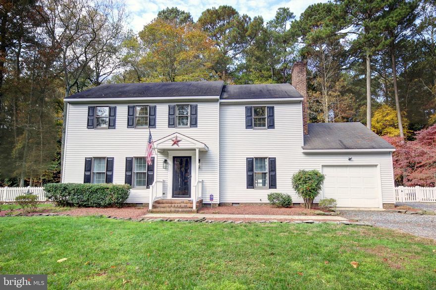 Opportunities like this are a rarity!  Welcome to this charming 4-bedroom, 2.5-bathroom colonial residence situated in the scenic Rustic Acres.  This well-appointed home offers a host of desirable features, including stainless steel appliances, a formal dining room, a spacious living room with an adjacent den, a cozy wood-burning fireplace, beautiful hardwood flooring, a generously sized walk-in closet in the primary bedroom, and the convenience of an attached 1-car garage.  Enjoy outdoor living with a screened porch, a rear deck, and a fire pit for relaxation and entertaining. Don't miss out on this exceptional opportunity. Contact us today to schedule a private showing and discover the potential of your future dream home.