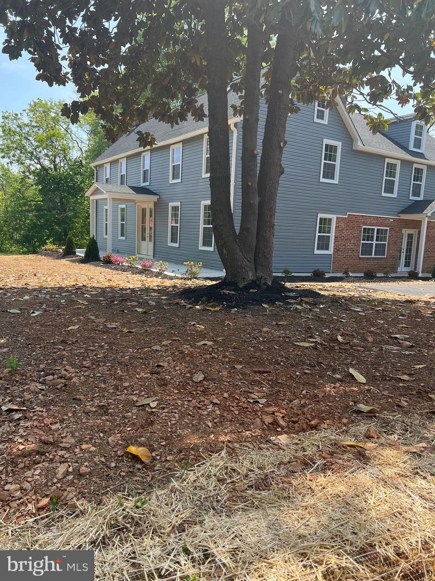 OPEN THOSE 9 FOOT FRONT DOORS, AND LOOK 3 STORIES UP,  THE BEAUTIFUL STAIR BANNISTER AND CIRCULAR STAIRWAY , IF ONLY IT COULD TALK..........THIS IMPRESSIVE BARNESVILLE HOME, SHOWS OFF ITS '1850' HISTORY, WITH THE MODERN UPDATES TASTEFULLY DONE JUST RECENTLY.
       YOUR NOT IN FOR A QUICK VISIT, TAKE YOUR TIME, AND GIVE YOURSELF AT LEAST AN HOUR TO GET ACQUAINTED WITH A LIFESTYLE.
       VERY ROOMY, TALL CEILING.............FLOWS WELL, GET READY TO ENTERTAIN TO ALL OF YOUR FRIENDS, YOU AND YOUR FRIENDS WILL ABSOLUTELY ENJOY THE INTERIOR, AND WONDERFUL
STONE PATIO OFF OF THE BRAND NEW DESIGNER KITCHEN AND FAMILY ROOM..
