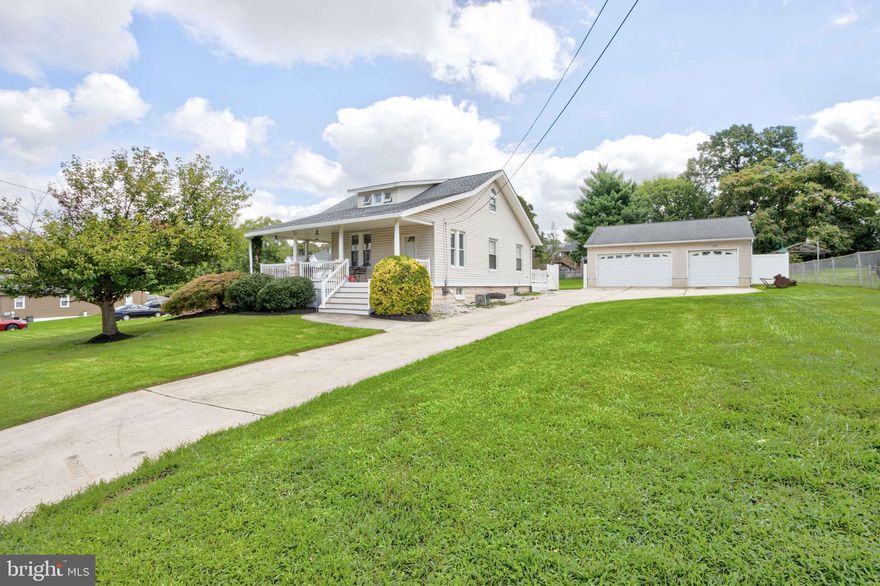 This is the one that you have been waiting for.  Perfectly placed wrap around  porch front over 0.7330 acre lot.  Excellent choice for blended family with spacious Primary bedroom on main level combined with oversized walk- in closet connected to full bathroom.  Freshly painted & newly refinished hardwood floors. Formal living, formal dining room with built-in window bench and access to side porch, neighboring kitchen.  Enjoy summer crab feasts in heated Florida room overlooking rear fully fenced yard,  under two ceiling fans & easy access to Trex deck steps from driveway .  Second level offers two bedrooms large closet and one bath.  Ideal lower level could easily be used as in-law suite with separate entrance and bathroom. Roof replacement 2020. Car enthusiast will really appreciate the heated three car garage equipped with automatic garage entrance, separate electrical  panel box with 220 volt 3 phase, shelves, upper storage & ceiling fans.  Concrete driveway can accommodate over four cars.  One block from Halethrope Community Civic Center offering basketball, playground, baseball diamond and open fields.  Ideal for DC commuter with the Marc Train stop just 1 mile away, 5.2 miles from Thurgood Marshall (BWI) International Airport and 6.5 miles to Downtown Baltimore.  Home Inspections are welcome for informational purposes.