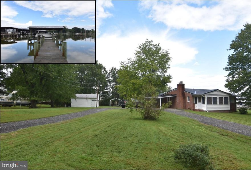 Waterfront on St Patrick's Creek with covered boat slip / boat house!. Renovations to the property over the last several years include:  Metal roof aprox 7 -8 yrs old, replacement windows, Well in 2007, A/C aprox 3 years old, Electric panel updated, oil tank. Detached garage /shop w/ electric.  Property has been maintained and in good condition.