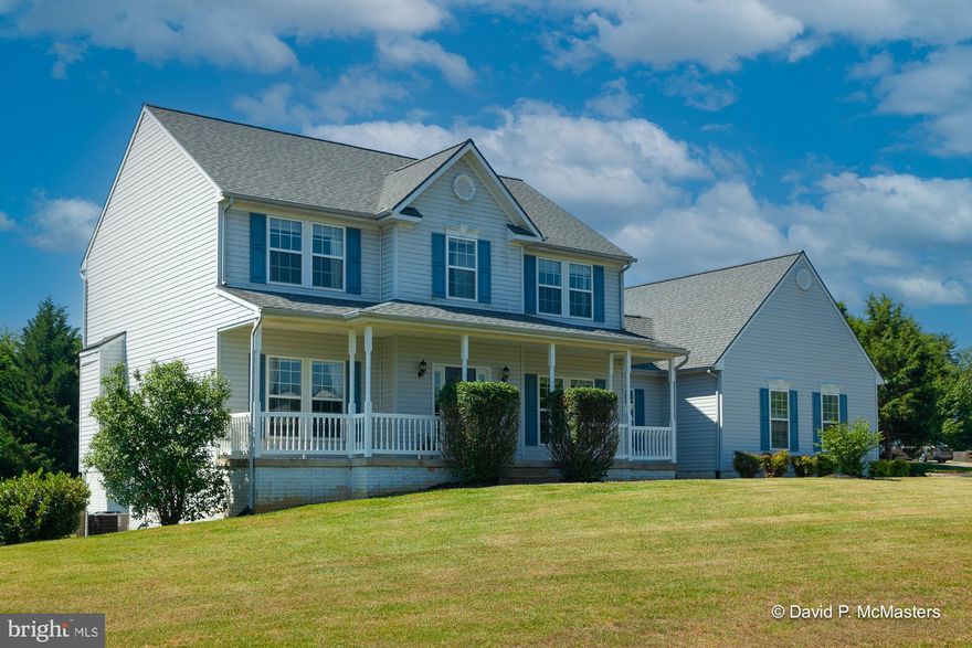 Amazing  location! Awesome t lot! Great floor plan! Lots of natural light. Large deck. Back yard is large, flat and fenced. View of treeline. On cul de sac. Refinished hardwood floors! Side loading garage. Mudroom. Main level laundry. Washer and dry convey. Large fully finished walkout level basement gets direct sunlight. Finished basement also includes full bath and office. Family room off kitchen has rough-in for fireplace.