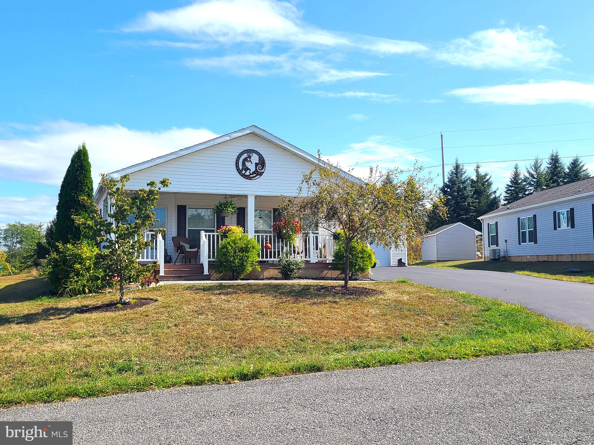 Enjoy easy living amongst the tranquil meadows of the Carlisle area with picturesque mountain views and relaxing creekfront recreation areas. This popular Creek View 55+ community is the finest of easy country living yet just moments from the hustle of city living! With 3 spacious bedrooms and 2 full baths, this move-in ready home is well appointed with welcoming hues and has been exceptionally maintained. Highlights include an expansive living room, updated stainless kitchen appliances and large formal dining room. The spacious owners suite includes large walk-in closet, ensuite bath with walk-in shower and soaking tub. Plenty of parking and storage in the oversized 3 car garage with a recently sealed driveway that’s large enough to hold several more cars! Enjoy relaxing on the rear patio with pond and firepit included amongst one of the largest lots in the development. Lot rent includes water, sewer and trash and tiered grass and snow maintenance packages are available for an additional fee. Schedule your showing today, this amazing home wont last long!
