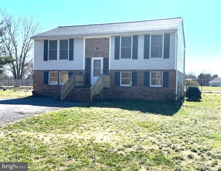 NEW REDUCED PRICE!  No HOA with this beautiful 4 bedroom, 2-bath split foyer.  Backs directly to the golf course offering expansive views of lush green fairways with plenty of space for work, play, and relaxation.  Newer luxury vinyl plank flows seamlessly through the kitchen, family room, hallway, and bath.  The bright kitchen offers a stainless steel fridge and dishwasher and a slider leading out to the freshly painted rear deck.  Two spacious bedrooms and full bath complete the upper level, offering a perfect layout for easy daily living.  The fully finished walkout basement offers a third bedroom, an additional family room (or 4th bedroom), a large full bath, and another flex room that could be used as an office, playroom, or extra storage.  Ceramic tile foyer.  Lower level laundry.   Oversized parking area.  Great location and right down the street from Cove Point Park.  SOLD AS IS.