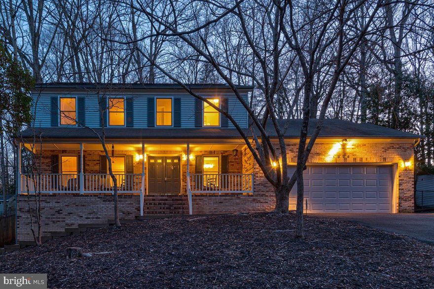 Beautiful home near the front gate of the sought-after neighborhood of Aquia Harbour!!  This home has it all!!  Beautiful open concept kitchen and family room.  Gorgeous sun room.  This home has SO much natural light.  Escape from it all on your beautiful front porch or HUGE back deck!!  This home offers so much privacy!!  Granite counter tops with stainless steel appliances.  Newly renovated bathrooms!  Giant walk out basement with home office AND another bedroom.  The basement could easily be an income property or perfect for large for a large family!  Huge rec area in the basement with built-ins and wet bar!  This home has a formal living room and dining room.  The master bedroom has a large sitting room. and walk-in closet.  You do not want to miss this gorgeous home!!