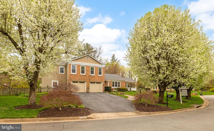 Nestled in the sought-after Ranleigh Manor Drive enclave, this gracious six-bedroom residence offers the perfect blend of timeless charm and modern sophistication. Thoughtfully expanded in 2007, the home is designed for effortless entertaining, with sun-drenched interiors, flowing living spaces, and elegant finishes throughout.

Step into the welcoming foyer and take in the freshly painted interiors and gleaming hardwood floors. The formal living and dining rooms provide an ideal backdrop for refined gatherings, while the spacious family room—anchored by custom built-ins—opens seamlessly to the heart of the home: a gourmet kitchen and light-filled breakfast room. Just beyond, a stunning sunroom with walls of windows leads directly to a sprawling deck, offering the perfect spot for al fresco dining or quiet mornings overlooking the lush, landscaped backyard.

Rarely found in McLean, the main level includes a generously sized bedroom suite with a private full bath—ideal for guests, multigenerational living, or a quiet home office. Upstairs, the serene primary suite serves as a luxurious retreat, featuring a large walk-in closet and an elegantly appointed en-suite bath. Three additional bedrooms, all well-proportioned with ample closet space, complete the upper level.

The fully finished lower level expands the home’s versatility, offering a large recreation room, an additional bedroom with full bath, and a dedicated storage/utility area—perfect for a home gym, media lounge, or guest accommodations.

This home has been meticulously maintained and thoughtfully upgraded over the years. Notable improvements include a roof replacement (2020), new gutters (2020), new garage doors (2015), a new and extended deck (2016), one HVAC system (2009). Other enhancements include new windows in 2006 (sunroom windows are special order with UVA protection), asphalt driveway (2016), flagstone walkway and built-in BBQ (2010), custom walkway railings (2013), and more—offering peace of mind and long-term value.

Set on a peaceful cul-de-sac, this home offers a rare combination of privacy, space, and convenience—just minutes to Tysons Corner, downtown McLean, Washington, D.C., and major commuter routes including the GW Parkway. Proximity to top-rated schools, upscale shopping, and fine dining further enhances the appeal.

This perfectly situated home in a private cul-de-sac is a rare opportunity. Don't miss it - schedule your tour today.