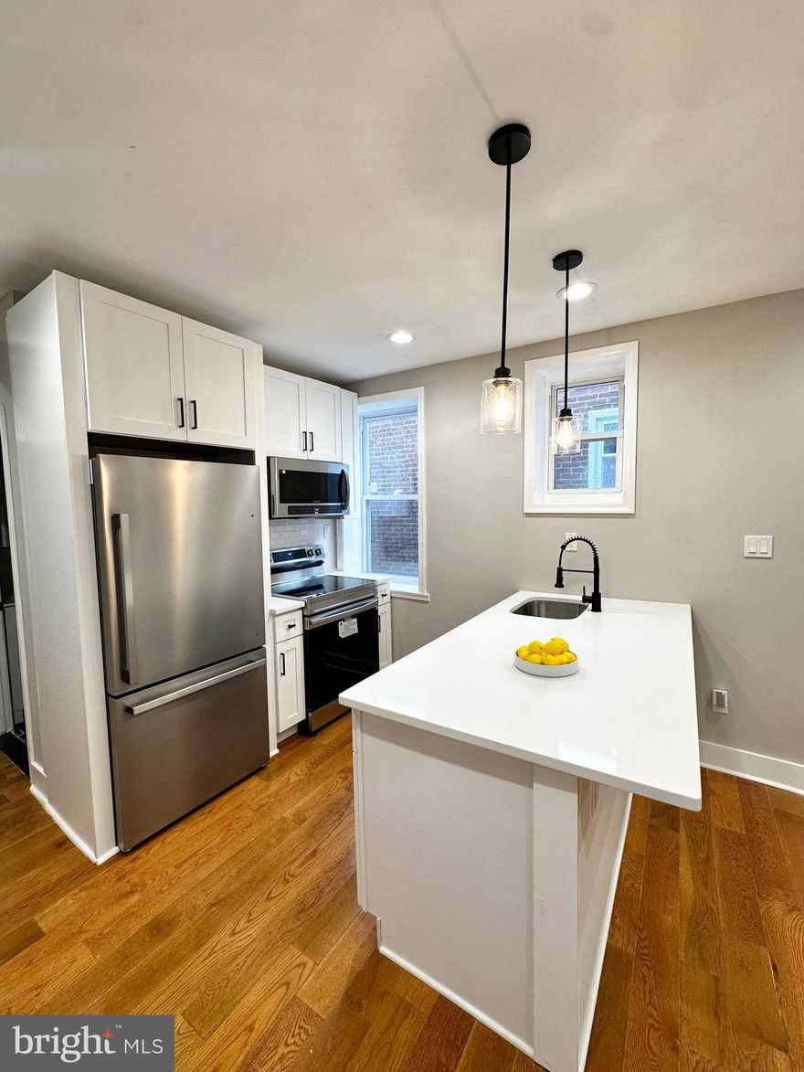 Newly renovated 3 Luxury units! Unit 3 , consists of 2 large bedrooms with large closets and bathroom. This unit boasts an open floor plan with a large kitchen and living room area. Stainless steel appliances, granite countertops, hardwood flooring, modern and contemporary living . Washer and dryer are in each unit. Central air and heat, along with a Ring Bell camera intercom system. 950+ Sq foot of living area high ceilings. walking distance from Temple University Hospital, And 15 minutes from Center City. Very close to all major transportations including the regional rail, 5 minutes from La Salle University, Einstein Hospital and major highways I-76 and I-95. Don’t miss out on this gem. Dog and cats are welcome. Tenants Only Pay Electric.