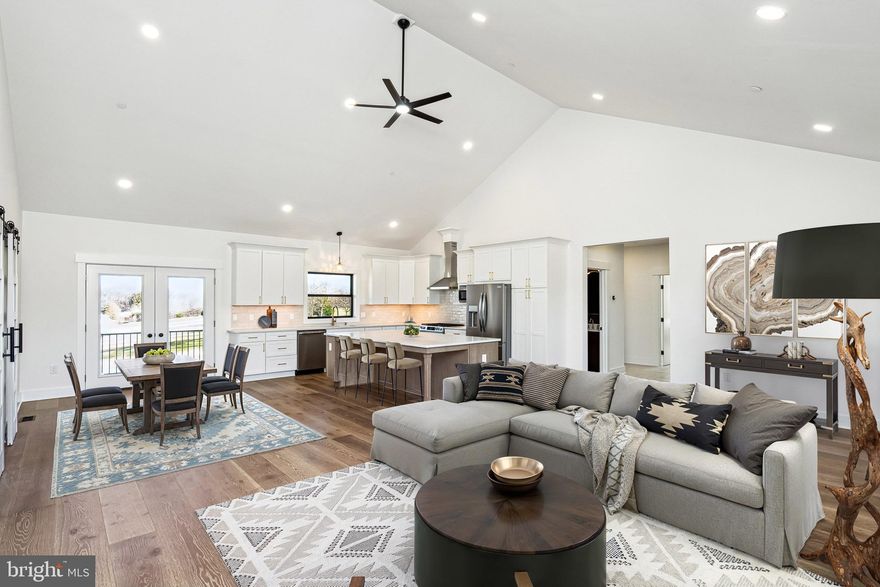 New-Construction Gem on Nearly 2-Acre Private Lot — 3651 Hanover Pike, Manchester, MD

Nestled in the rural heart of Carroll County, minutes from the PA line, enjoy rural tranquility with close access to shopping, schools, and major routes for commuting.

Discover modern luxury and country charm at this brand-new custom home, thoughtfully set on nearly 2 acres in Manchester. This home combines modern design, timeless finishes, and functional comfort for today’s lifestyle.

The main level is designed for convenience, featuring a luxurious primary suite with spa-inspired bath, plus two additional bedrooms, and a full hall bath. Everyday living is made easy with a mudroom, powder room, and spacious laundry room with ample storage, all also located on the main level.  The gourmet kitchen features stainless steel appliances, quartz countertops, an oversized center island with seating, and abundant cabinetry  — ideal for gatherings or quiet evenings at home. 

The partially finished basement adds valuable flexibility with a fourth bedroom, plus a roughed-in full bathroom awaiting your finishing touch — perfect for guests, extended family, or a private office.

Outdoors, enjoy nearly 2 acres of open space, offering privacy and room to create your own backyard retreat, all while remaining close to everyday conveniences.

With superior craftsmanship, energy-efficient systems (tankless water heater, dual-fuel HVAC, owned propane with monitoring system, and a fully integrated SMART home technology—including automated lighting and a whole-home water safety system*) and a design that balances elegance with practicality, this home is truly move-in ready.

Don’t miss your chance to own this new home under $700K — schedule your showing today.

*One or more images have been virtually staged to show possible furniture layout.