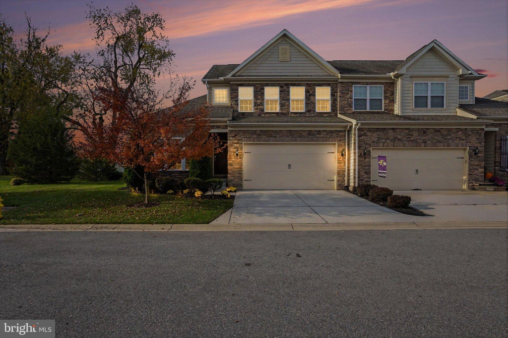 Photo of 25 Trail Ride Drive #437, TANEYTOWN, MD 21787 (MLS # MDCR2038640)