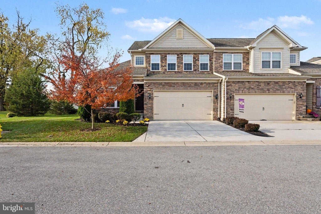 Photo of 25 Trail Ride Drive #437, TANEYTOWN, MD 21787 (MLS # MDCR2038640)