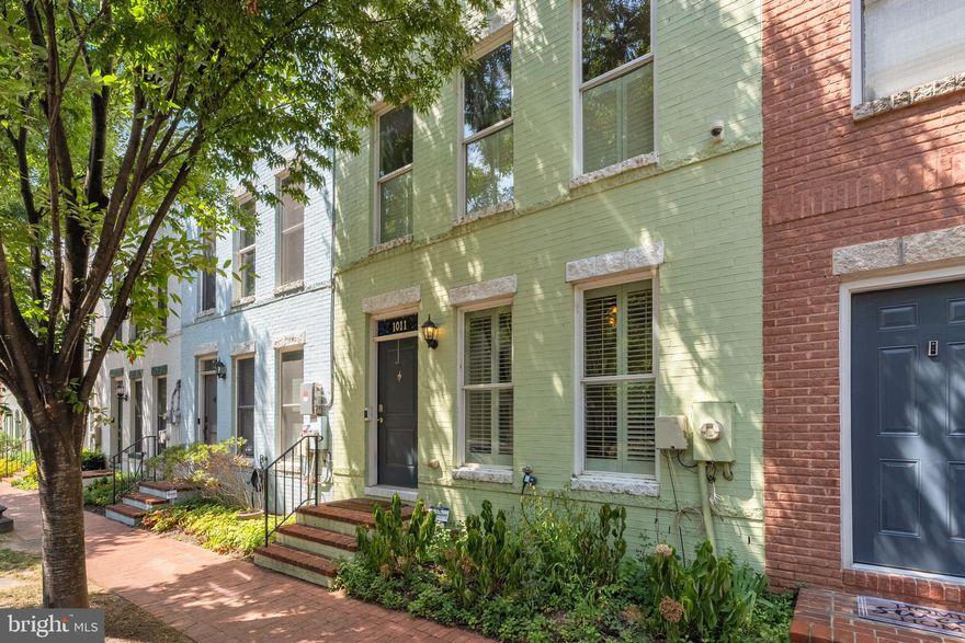 Located in the highly sought-after Capitol Quarter community, this spacious four-story Banneker model offers an ideal combination of modern design, flexibility, and convenience. Spanning four finished levels, the home features four bedrooms, three and a half bathrooms, and a two-car garage.

The entry level includes interior access to the garage and a versatile room that can function as a bedroom, home office, or den. Upstairs, the main living level showcases an open-concept layout with a chef’s kitchen featuring an oversized island, granite countertops, and stainless steel appliances. The kitchen opens to the dining area and family room, complete with a Juliet balcony and gas fireplace, creating a perfect flow for everyday living and entertaining. A powder room completes this level.

The third floor hosts the primary suite, offering a walk-in closet and a spa-inspired bath with dual vanities, a soaking tub, and separate shower. A secondary bedroom with its own en-suite bath provides privacy and convenience.

The top level features an additional bedroom with en-suite bath and a spacious living area that opens to a private rooftop deck, perfect for relaxing or entertaining with neighborhood views.

Ideally positioned near Navy Yard’s restaurants, shops, parks, and Metro, this Capitol Quarter residence combines timeless design with modern functionality in a truly unbeatable location.