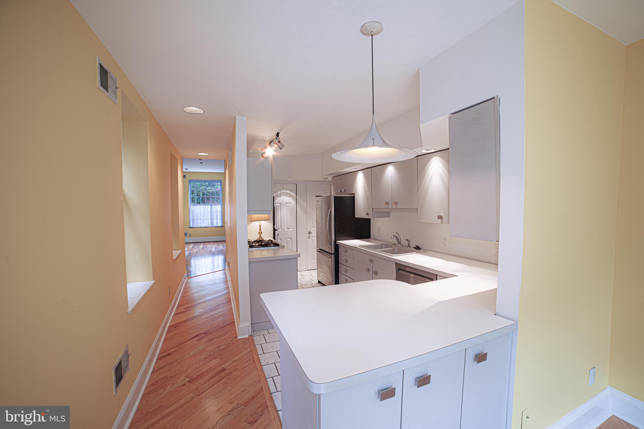 Welcome to this charming 3-story home in a prime location in Philadelphia’s beloved Fairmount neighborhood. Combining classic charm with modern updates, this bright and cheery home features a cozy fireplace, an open living room with large windows, and a sunny atrium dining area perfect for entertaining and overlooking the lovely garden.  The second floor features two spacious bedrooms, a walk in closet, and an extra large bathroom with a jacuzzi tub.   The awesome third floor suite features the primary bedroom with a convenient dedicated laundry area, private bathroom, and access to an incredible roof deck with expansive skyline views!   First time available in over 30 years- bring your personal touches to create your dream home!   Steps from the Art Museum, a short walk from Center City, and easy access to bus routes and running trails, this is THE prime Art Museum area location. It is surrounded by local amenities like coffee shops, bars and restaurants, Whole Foods, community garden, weekly Farmers Market, Kelly Drive and the river, Fairmount Park, and world renowned museums. Fairmount offers a unique opportunity to live in a thriving community with plentiful green space in the heart of the city!