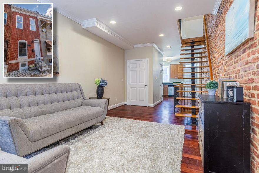 WHY RENT WHEN YOU CAN BUY THIS PICTURE PERFECT RENOVATION IN PATTERSON PARK!  Features include an open floor plan with gleaming hardwood floors, exposed brick, and crown molding, a Chef's kitchen with granite counters & ss appliances, main level half bath, custom made floating staircase with custom made decorative railings leading to the 2nd level which offers 2 bedrooms a large full bath with double sinks, separate whirlpool tub, and walk-in shower with dual shower heads, an improved basement with laminate flooring and laundry area, and a rear patio that's perfect for entertaining!  Located close to Patterson Park and Johns Hopkins!  Pack your bags and move right in!