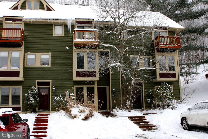 The Best of Both Worlds – Lake Access & Ski In/Ski Out Living!

Looking for the perfect Deep Creek Lake getaway with both lake access and ski slope convenience? Welcome to this charming 3-bedroom, 3-bath townhome located in one of the area’s most sought-after communities. Nestled in a park-like setting with beautiful shared lake access and just steps from ski-in/ski-out trails, this home offers year-round recreation right at your doorstep.

Inside, you'll find two separate living areas, ideal for entertaining or giving everyone their own space to relax. Step outside onto the expansive back deck—perfect for grilling or enjoying peaceful mountain evenings. Recent updates include Trex-style decking on all balconies and the rear deck, three new Andersen exterior doors, and a mini-split A/C system for added comfort.

The kitchen features a newer oven/range and a recently replaced hot water heater and washing machine ensures peace of mind. All of this, just minutes from Deep Creek’s best shopping, dining, and the Wisp Resort’s golf and ski amenities.

Whether you're looking for a full-time home, vacation retreat, or investment property, this is your opportunity to own a little slice of heaven in Deep Creek Lake. Don’t miss it—schedule your showing today!