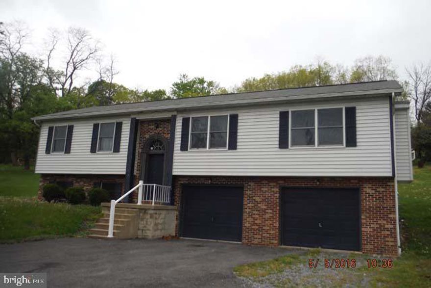 Beautiful location for this charming four bedroom bi-level home. Double lot with Southern Exposure offers option for public water & sewer! Partially finished basement with 2 car integral garage. Located near schools, stores, recreation and easy highway access.,No Doublewides,No Singlewides