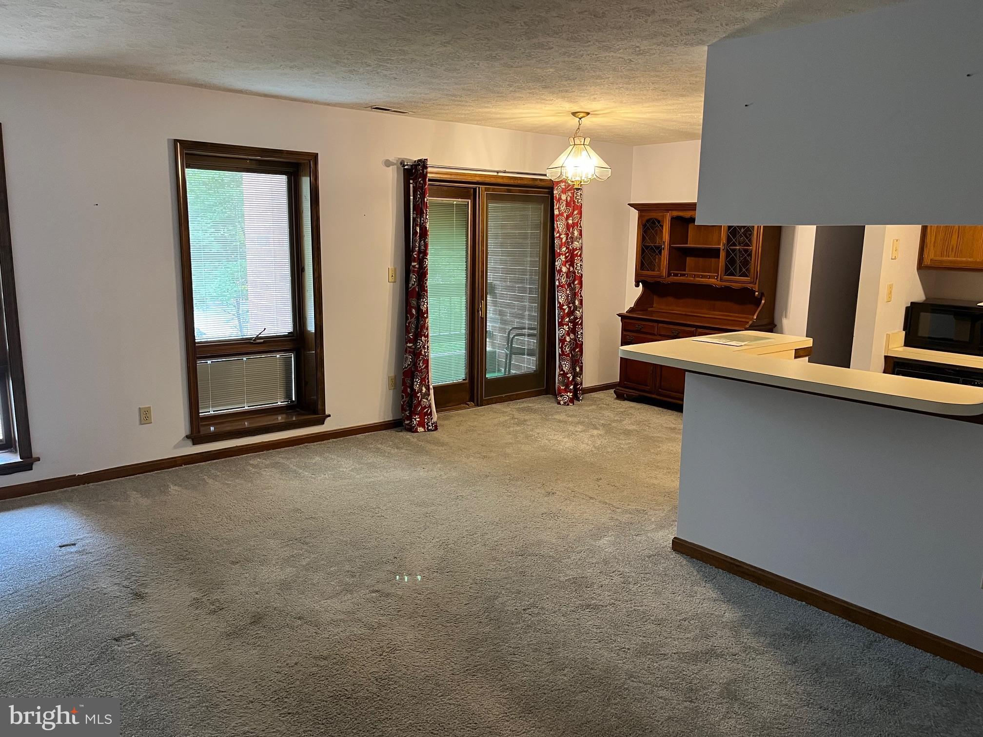 Available now, this well-maintained 1 bedroom, 1 bathroom condo at 23243 Rosewood Ct #C-9 is located in the desirable Wildwood neighborhood of California, MD. Priced at $1,800/month, the tenant is responsible for electric, while the owner covers the monthly condo fee, water, and trash service. The unit features a refrigerator, stove, dishwasher, microwave, and stackable washer and dryer, with full carpeting throughout except for the kitchen and bathroom. This fantastic location offers easy commuting and is close to abundant shopping, dining, and entertainment options, just minutes from Leonardtown and the beautiful Solomons waterfront. No pets and no smoking. Good credit and proof of income are required. Apply online via RentSpree at https://apply.link/Bj2en9w. Housing vouchers are acceptable.