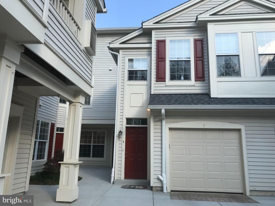 Wonderful, Light-Filled 2 bedroom, 2.5 bath Condo in N. Reston.* 1 Car Attached Garage * Wood Floors through on Main and Upper  Level* new Washer/Dryer in unit* Balcony off Kitchen , facing trees* Freshly Painted * MOVE IN Ready!
