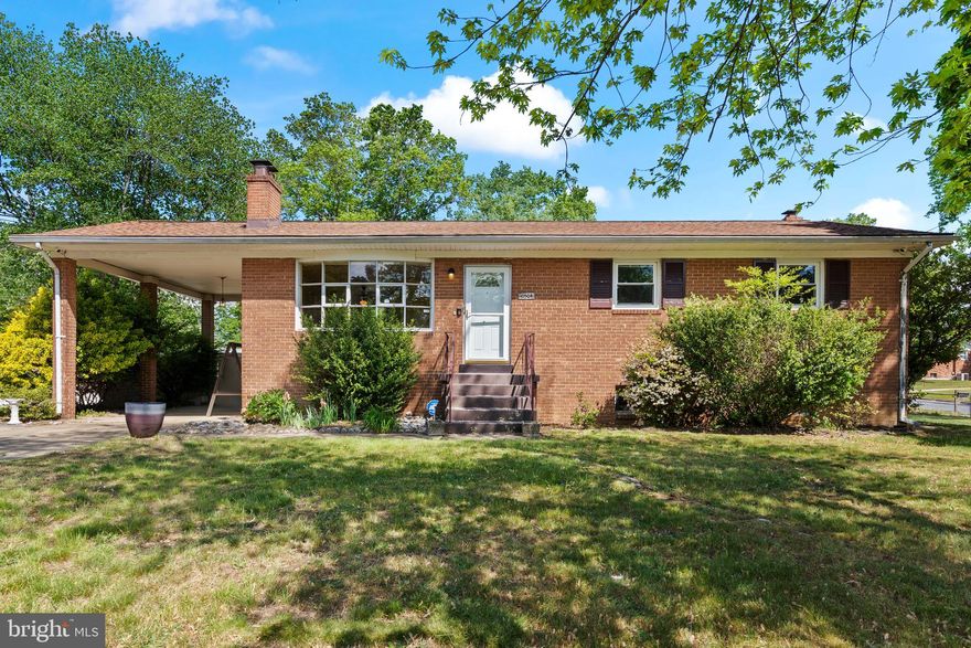 SOLID BRICK RAMBLER with space, flexibility, and opportunity in the heart of Clinton! Situated on a corner lot, this 4 Bedroom 3 Bathroom home offers classic charm, hardwood flooring throughout much of the main level, and a layout full of possibilities for homeowners and investors alike.

The main level welcomes you with a bright living room featuring a large picture window that fills the space with natural light, hardwood floors, and a fireplace that creates a warm focal point. The adjoining dining area flows directly to the covered rear deck, making it easy to enjoy indoor-outdoor living and entertaining. The kitchen offers ample cabinet space, gas cooking, and functional layout potential for future customization.
Down the hall, you’ll find three bedrooms and two full bathrooms upstairs, including a primary suite with its own private bath. Hardwood flooring continues through the bedrooms, adding character and continuity throughout the home.

The lower level expands the possibilities even further with a large finished recreation area featuring a second fireplace, full bathroom, kitchenette area, and multiple flexible-use spaces that could work well for an in-law setup, extended living arrangement, guest space, home office, hobby area, or additional bedroom space. Separate lower-level access adds even more versatility.

Outside, enjoy the covered rear patio/deck area, fenced portions of the yard, carport parking, and the convenience of a corner lot location with mature trees and established surroundings.

Whether you’re looking for a primary residence with room to grow, a multi-generational living opportunity, or a property with strong long-term potential, this Clinton brick rambler offers space, flexibility, and value all in one.