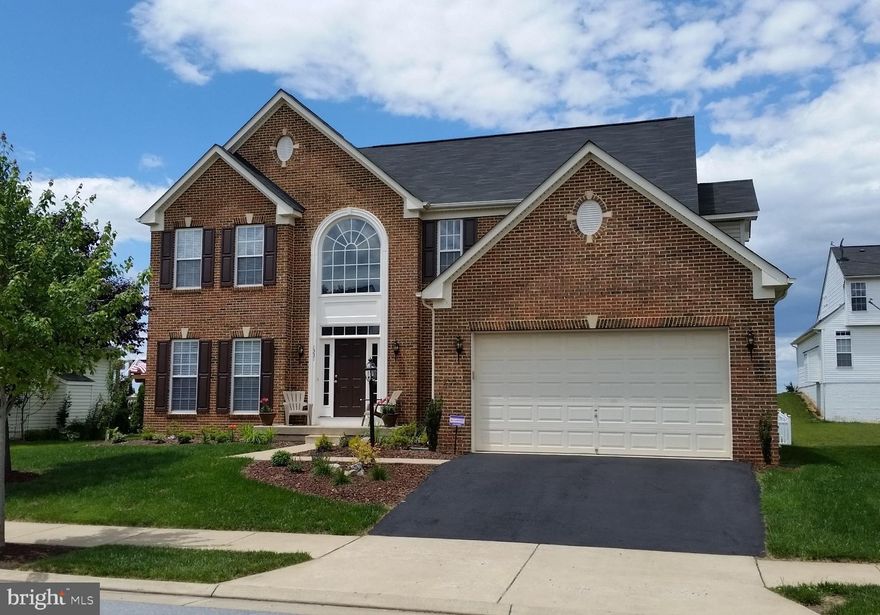 Large open two-story foyer and hardwood flooring throughout the main level.  Open kitchen with upgraded appliances and counter-tops.  Large master suite with master bath plus three additional spacious bedrooms.  Large open basement ready to be finished with full bath rough-in.  Ceiling fans throughout the house and Trec deck in backyard.