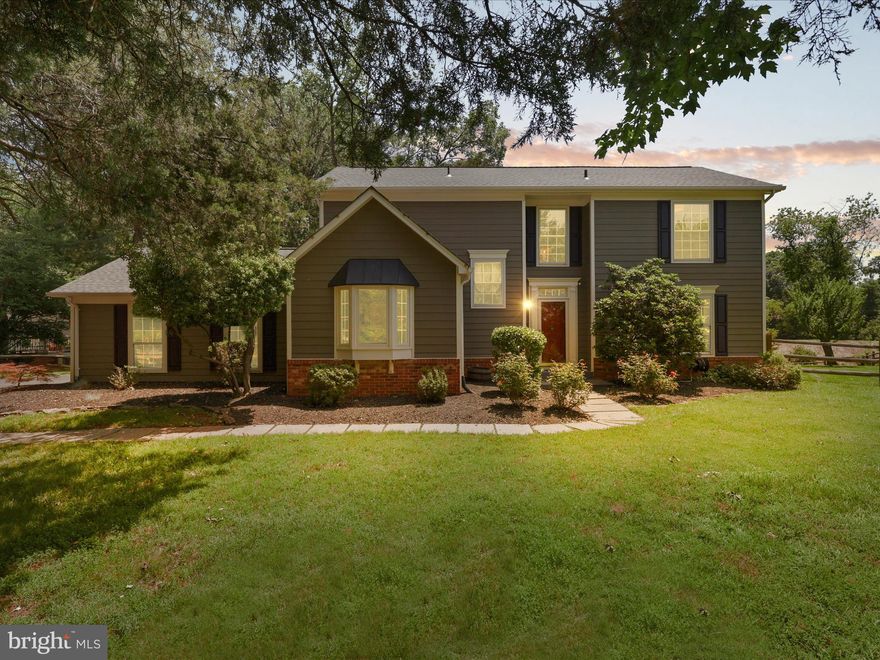 $50K Price reduction****Exquisite LAKEFRONT Retreat on 0.60 Private Acres in Prestigious Fairfax County.  Bring your canoe or paddleboard!  Welcome to a rare offering—an elegantly remodeled 4-bedroom, 2.5-bath lakefront estate, perfectly positioned on a lush, professionally landscaped lot in sought-after Herndon. This exceptional residence offers timeless sophistication with rich hardwood flooring, expansive picture windows, and a stunning wood-burning fireplace that anchors the sunlit 2 story living room.  The gourmet chef’s kitchen is a showstopper, featuring sleek stainless steel appliances, abundant cabinetry, open shelving, and generous quartz countertops designed for both everyday living and effortless entertaining. A refined dining room with custom live-edge built-ins offers the perfect setting for intimate dinners or festive gatherings.  Step outside to your private oasis—an expansive deck w/ hot tub (AS-IS) overlooking breathtaking lake views, manicured gardens, and seasonal blooms. It’s a peaceful, picturesque setting rarely found in Fairfax County.  The luxurious main-level primary suite is a true retreat, boasting hardwood floors, a spacious walk-in closet, and a spa-inspired en-suite bath with a custom walk-in rain shower. Upstairs, three generously sized bedrooms share a beautifully appointed full bath. The lower level offers a flexible, finished space with endless possibilities—ideal for a home theater, fitness studio, game room, or guest accommodations—all with ample storage.  Unbeatable location just minutes from Fairfax County Parkway, Reston Parkway, Routes 50 & 28, upscale shopping, fine dining, and more.  NOTE:  The lake was recently drained to safely construct improvements to the dam embankment, fore-bays and spillways at the Lake.  Once completed, the lake will be restored to it's original natural beauty!