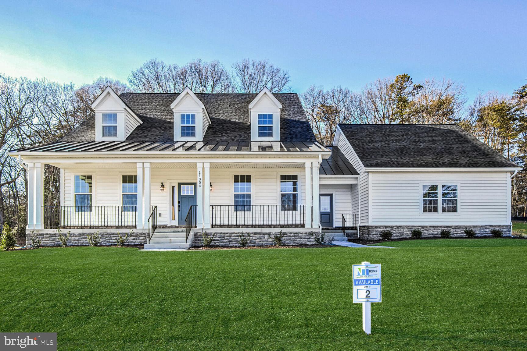 **Ready for Quick Move-in!** Gorgeous newly-built Chesapeake Model Cape Cod home in the bucolic Retreat at Glenn Dale community, by acclaimed builder Ness-Twigg. Situated on a 1/2 acre lot on a quiet culdesac surrounded by mature trees, this community with NO HOA is ideally-located just minutes from DC, Annapolis, and Ft Meade but with the peaceful serenity of sought-after Glenn Dale. Discover luxurious finishes throughout this 4-bed, 3.5-bath single family home with over 6000 sq ft and a 3-car garage. Luxurious details throughout include 9-ft plus ceilings on every level, craftsman-style window casings, Kohler plumbing fixtures and Schlage interior handles. Main level boasts open-layout with upgraded 8" wide-plank BJELIN Woodura Hardened Wood floors throughout – Scandinavian-designed and ethically-sourced wood floors that are 3X stronger and nearly water-proof as compared to traditional hardwood floors. The two-story Great Room and the adjacent luxurious kitchen are the focal point of this home, offering quartz countertops, high-end stainless steel Bosch appliances including French-door refrigerator, Kohler designer faucet, customizable cabinets, recessed lighting, large island with pendant lighting for entertaining, and subway tile backsplash. Revel in single-level living via the main level Owner's Suite with two walk-in closets, tray ceiling, adjacent laundry room and featuring a spa-like ensuite full bathroom with top-of-the-line Schluter®-Kerdi waterproofing system standing shower, black Kohler Riff fixtures, ceramic tile floors and shower walls, and quartz dual-sink vanity. A formal dining room, powder room, mud room with built-in storage cubbies and second entry, and a library or in-home office, complete the main level. Three additional light-filled and spacious bedrooms and two full baths on the upper level. Versatile lower level can be designed to meet all of your needs, including a potential 5th bedroom and additional full bath, large entertainer's rec room, multiple storage rooms or dens, and an areaway for walk-up access to the rear yard. Energy-efficient and top-of-the-line construction features, including lifetime Tamko® Titan XT Premium Architectural Roof, high-efficiency Carrier HVAC, "maintenance-free" low-E argon windows and Variform® Victoria Harbor siding, Energy Star water heaters, oversized 400-amp electrical service, Masonite® Winslow insulated fiberglass front door, Aprilaire humidifier, R49/R21 insulation package, and Barricade® Wrap Plus™ Ultimate protection against wind, air and moisture. Level 2 electric car charger included! Relax on the composite rear deck overlooking a landscaped backyard with tree-lined views, perfect for outdoor enjoyment! All buyers receive 10-year RWC 2/10 home warranty for peace-of-mind.