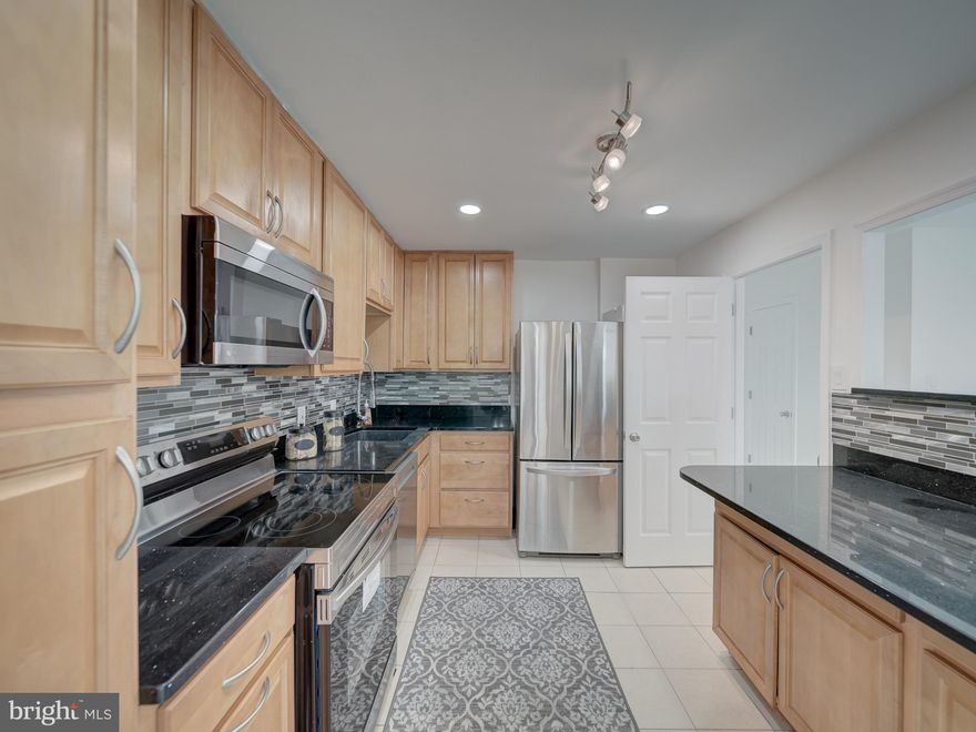 This condo is 100% ready for Your buyers!!This lovely  Fifth-floor  beauty  has been beautifully redone  at Columbia Towers.  This Condo features a Semi Open-concept kitchen and living area & Dining area flooded with lots  of  natural light. This  luxurious condo  offer 2  very spacious  bedroom, 2 remodeled baths withJacuzzi jet tub with  tasteful tile work . also  42" upgraded  kitchen Cabinets, granite countertops, Updated stainless steel appliances, Top of the line  engineer wood flooring throughout the entire condo, almost new windows, Upgraded granite vanities, updated  fixtures, recess lighting, large closets  , spacious balcony and lists goes on and on... Your buyers will  Enjoy the peace of mind in a secure building that offers a community pool and club room.  It is also perfectly positioned  just off Route 29,  what make this a commuters dream with quick access to the ICC, 495, and the metro, making downtown Silver Spring, DC, and Baltimore just minutes away.