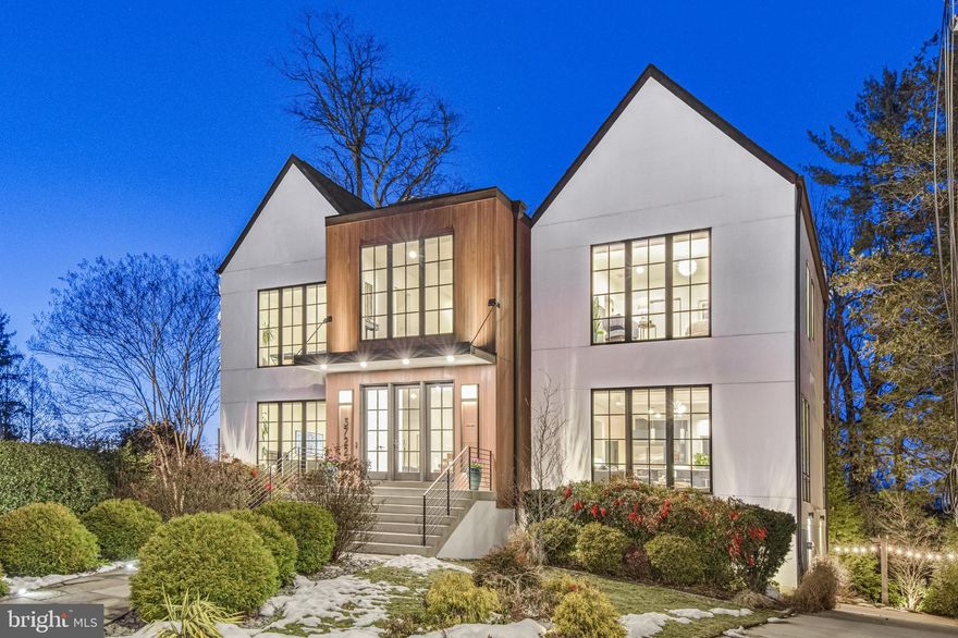 DON'T MISS YOUR SECOND CHANCE AT THIS LAVISH RESIDENCE WITH A CONTEMPORARY FLAIR!!

Yes, the word for the home is lavish. You’ve earned it. You work hard and deserve the luxuries and conveniences that your livelihood affords you. You drive through this lovely neighborhood to its imposing presence and pull into your two-car garage to charge your Tesla.

You leave your briefcase, coat and shoes in the custom built-ins in the convenient mud room. You can relax with a drink at your wet bar and catch up on the news or review the day with your partner. If you prefer to decompress in your exercise room, it’s ready and waiting for you. Or perhaps you prefer to putter in your private garden before dinner.

As you head upstairs, the aroma of cooking food greets you. That expansive kitchen with all the current conveniences and high end appliances was worth every penny. You can dine alfresco on the screened porch or enjoy the view from your dining room. Since the main level has an open floor plan, you have multiple choices for layout. That same flexibility allows excellent flow for parties inside or out. If you have brought home work from the office, the self-contained room is perfect for your office or just a get-away space.

Come bedtime, you climb the floating staircase to the primary bedroom with a vaulted ceiling and a walk-in closet with a keyed door to protect your valuables. The en suite bath has large soaking tub, heated floors  and views of the tree tops--perfect for relaxing. The other three bedrooms are apart from your room, so everyone has privacy and quiet.

This is your private domain minutes from Washington Golf and Country Club, DC, Tyson’s Corner, parks and more. You’ve earned it.