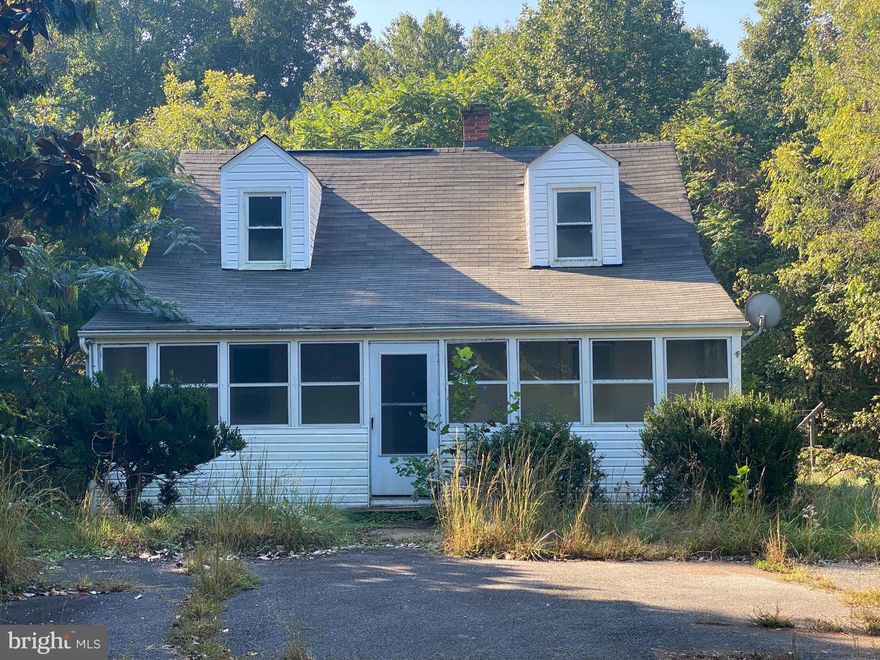 This is your opportunity to own a piece of Historic Eagle Harbor, located just a few miles from the Patuxent River. This cape cod home is situated on a beautiful 1-acre lot that backs to a forested area. The home will require a complete rebuild or tear down to build your dream home,  This is sold as-is, cash or hard money. Home is in a prime location with easy commuting distance to Washinton DC and area military installations.