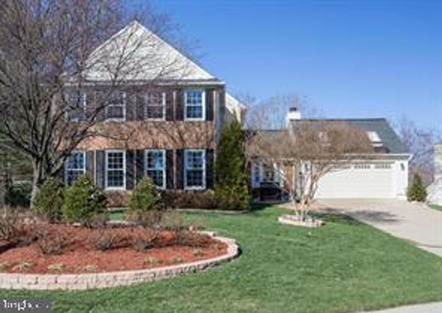 Beautifully situated on a corner lot in desirable Lake Ridge, this stunning home offers all the comforts you’ll need!   Upon entering, you’ll notice the beautiful hardwood flooring, Pottery Barn and Restoration Hardware Lighting, and Serena and Lily wallpaper.  The spacious living and dining rooms provide plenty of room for family time and entertaining.  A private office with French doors is off the entrance foyer.  They say the kitchen is the “heart of the home”, and this one does not disappoint!  There’s plenty of room to gather around the 14’ center island.  The kitchen has been tastefully remodeled with 42” cabinetry, quartz countertops, Kitchenaid stainless steel appliances, and marble backsplash. Off the kitchen is the family room with cathedral ceiling and gas fireplace.  From there, you’ll enter the spacious screened porch with Trex flooring and a connecting Trex deck.  Upstairs there are 3 generous bedrooms and hardwood flooring.  The primary bedroom has 1 large walk-in closet with Container Store Elfa shelving and 2 additional closets.  The primary bathroom has been remodeled with Travertine tile and walk-in shower.  In the finished walk-out basement, there’s a large 4th bedroom (NTC) with a cedar-lined walk-in closet with connecting full bath.  From the rec room, you can access the fenced backyard retreat.  Features include extensive hardscaping, patios, stone retaining walls, a built-in fire pit, and in-ground irrigation system!  The home offers plenty of closet space and an easy-access attic in the garage.  Lake Ridge HOA manages the upkeep of 1400 acres of common ground.  HOA fees include use of five pools, a spray ground, sports fields, tennis, pickleball, basketball, volleyball courts, fitness stations, trails, playground, boat ramp, and community centers.  Your home is minutes to shopping and dining, I-95, commuter options, Potomac Mills, and Historic Occoquan. Hurry, and don’t let this one get away!