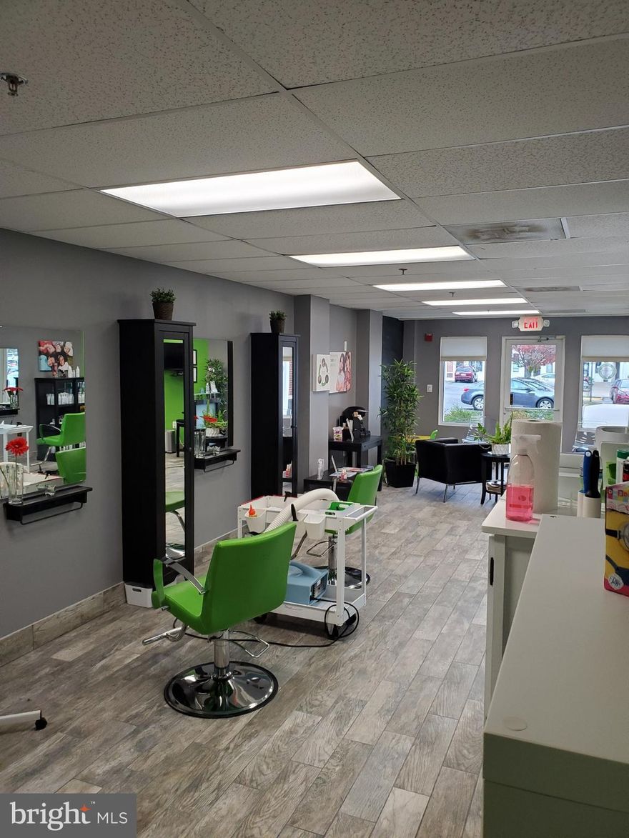 Rarely available Ground floor Retail Store front that is fully built out as Salon***The open layout can easily be converted to other business uses such as CHURCH, OFFICE ADMIN, DENTAL, MEDICAL, DELI/RESTAURANT, BARBER/SALON, AND MANY OTHER USES WITH FLEXIBLE ZONING.  Unit is fully ADA approved,  and currently vacant.  Ample parking and Convenient location just off PW PKWY.  MONTLY CONDO FEE OF $400 COVERS ALL UTILITES AND EXTERIOR BUILDING MAINTENANCE**UNIT IS ALSO AVAILABLE FOR LEASE AT $1800.00 PER MONTH**