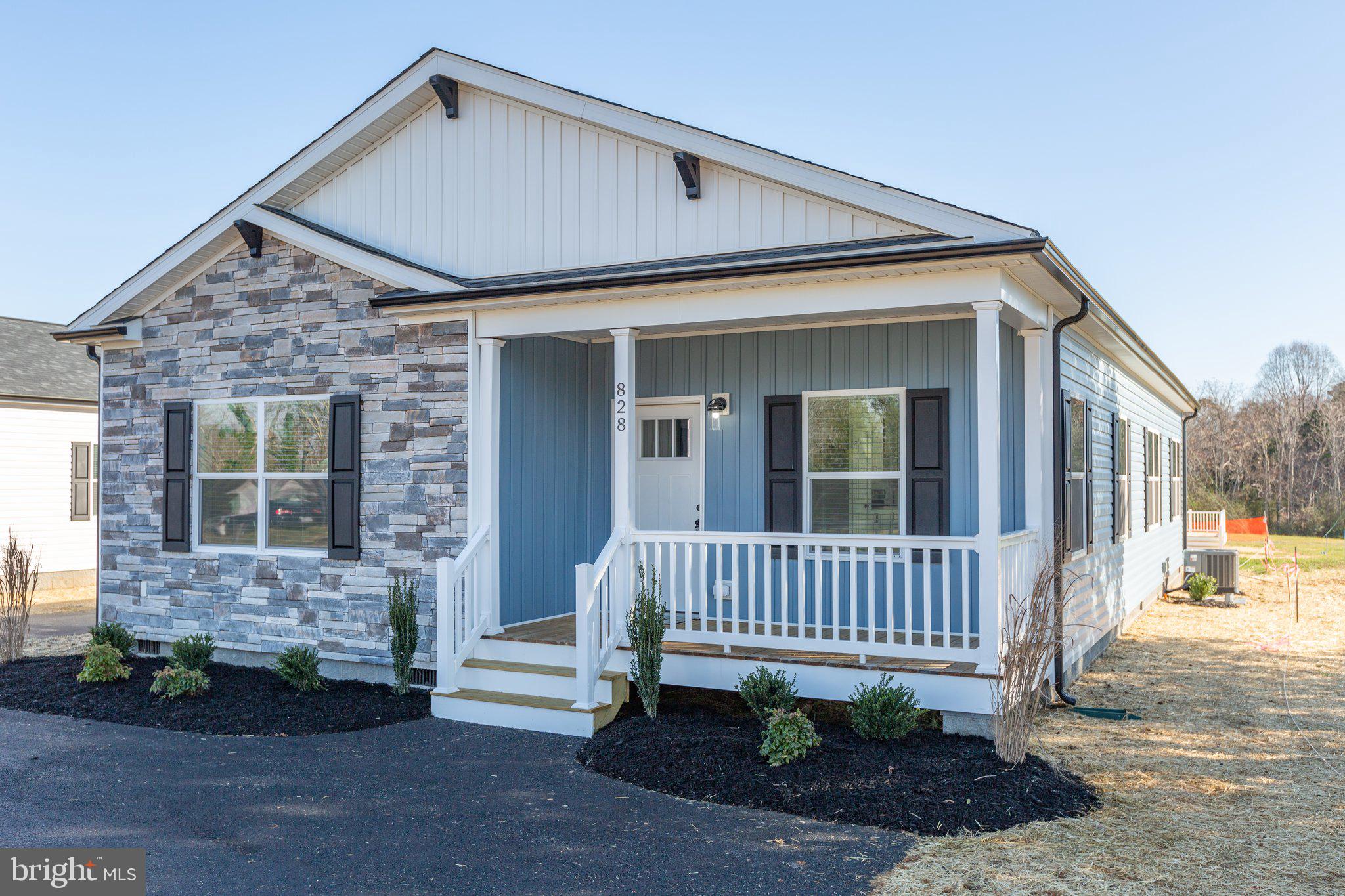 COMPLETE & MOVE-IN READY! Brand-new 3BR/2BA home offering over 1,700 sq. ft. of modern living in the heart of town. Features include 9’ ceilings, crown molding, recessed lighting, black fixtures, pendant lighting, oversized ceiling fan, and custom shiplap accents. Kitchen boasts quartz countertops, tile backsplash, stainless steel appliances, and a large island with abundant cabinet space. Dining room includes sliding glass door leading to a 12x14 rear deck with vinyl rails.
Primary suite offers walk-in closet, dual vanities, and custom tile shower. Exterior highlights include 6’x15’ covered front porch with stacked stone, black gutters and pediments, professional landscaping, and paved parking. Connected to public water and sewer.
Great location—15 mins to Lake Anna, 40 mins to Short Pump, and 45 mins to Charlottesville. Local park and baseball field within walking distance. High school with track just 1.7 miles away. Dog park located 2 miles from the home.
Louisa County schools have been a top-rated school district—recognized as one of the 2023 Best School Districts in America. Seller will cover first year of lawn maintenance. Additional lots and floor plans available.