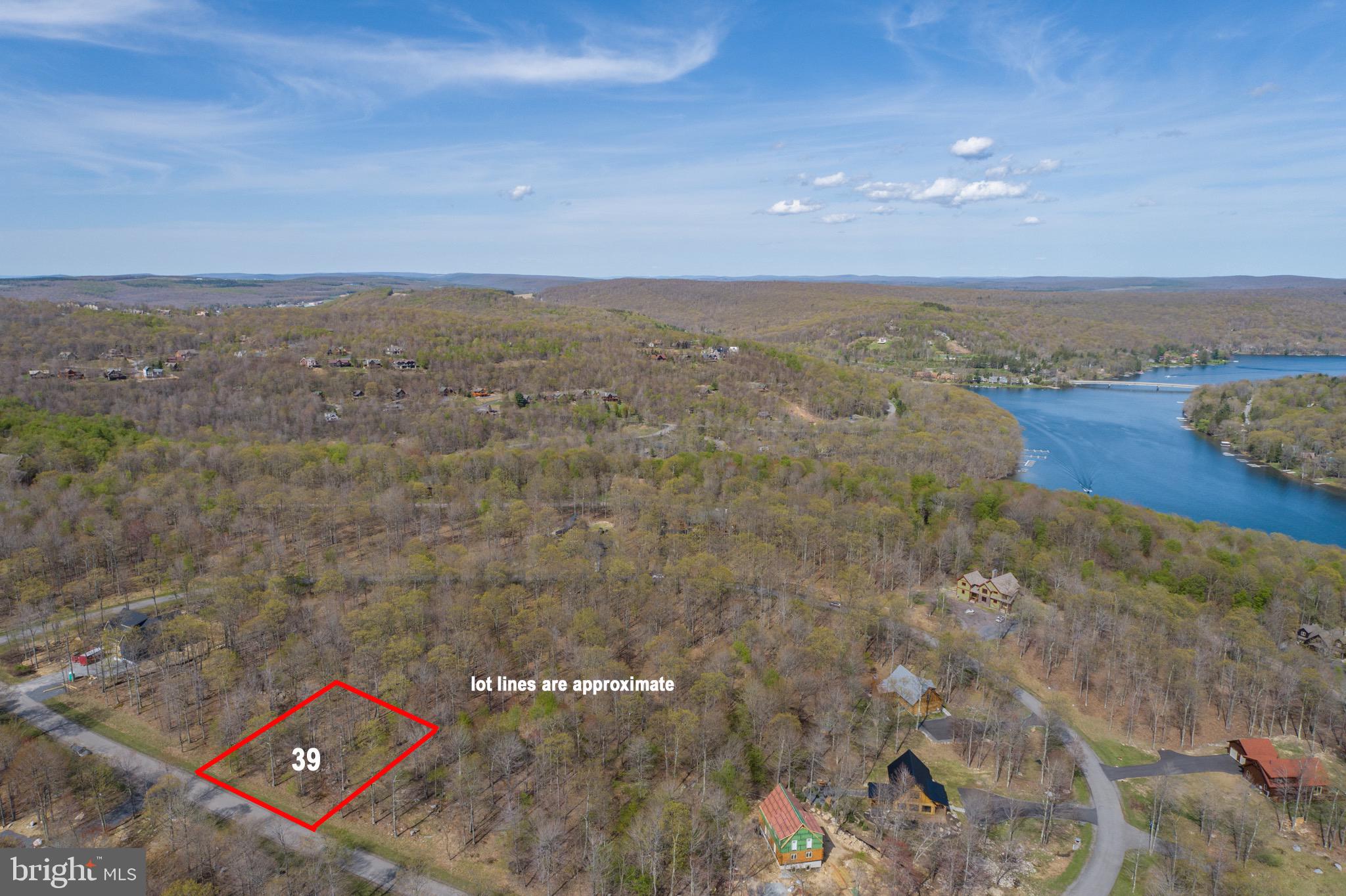 Lot 39 Fern Loop provides an opportunity to build your mountaintop dream home! Located in the Sandy Shore community, this property offers a quiet setting with paved roads, electricity, water and sewer already at the site. Sandy Shores is just a few minutes drive to the top of Wisp Resort, and down the hill to all of the areas most sought after restaurants, Deep Creek Lake and all that the area has to offer Looking for a great opportunity to build your mountain getaway? Call today!