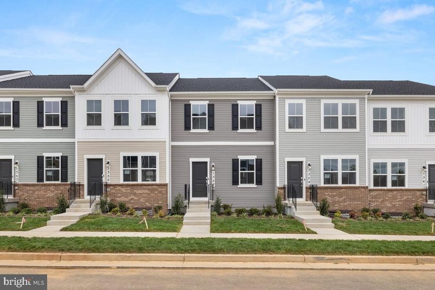 Brand new home for rent  in Red Clover Meadows! Available for immediate move in.  Pets accepted case by case. Rare main level entrance townhome. Upstairs features three bedrooms and two full bathrooms. The main level and the basement each with their own half bathroom. Open concept floor plan. Off of the eat in, gourmet, kitchen is a large composite deck. The two car, rear entrance, garage opens into the basement with an additional bonus room; useful for office or fourth bedroom. Less than a mile to The Potomac Marketplace shopping center.  $65 per adult application fee. Immediate move-in available. Schedule a tour today!